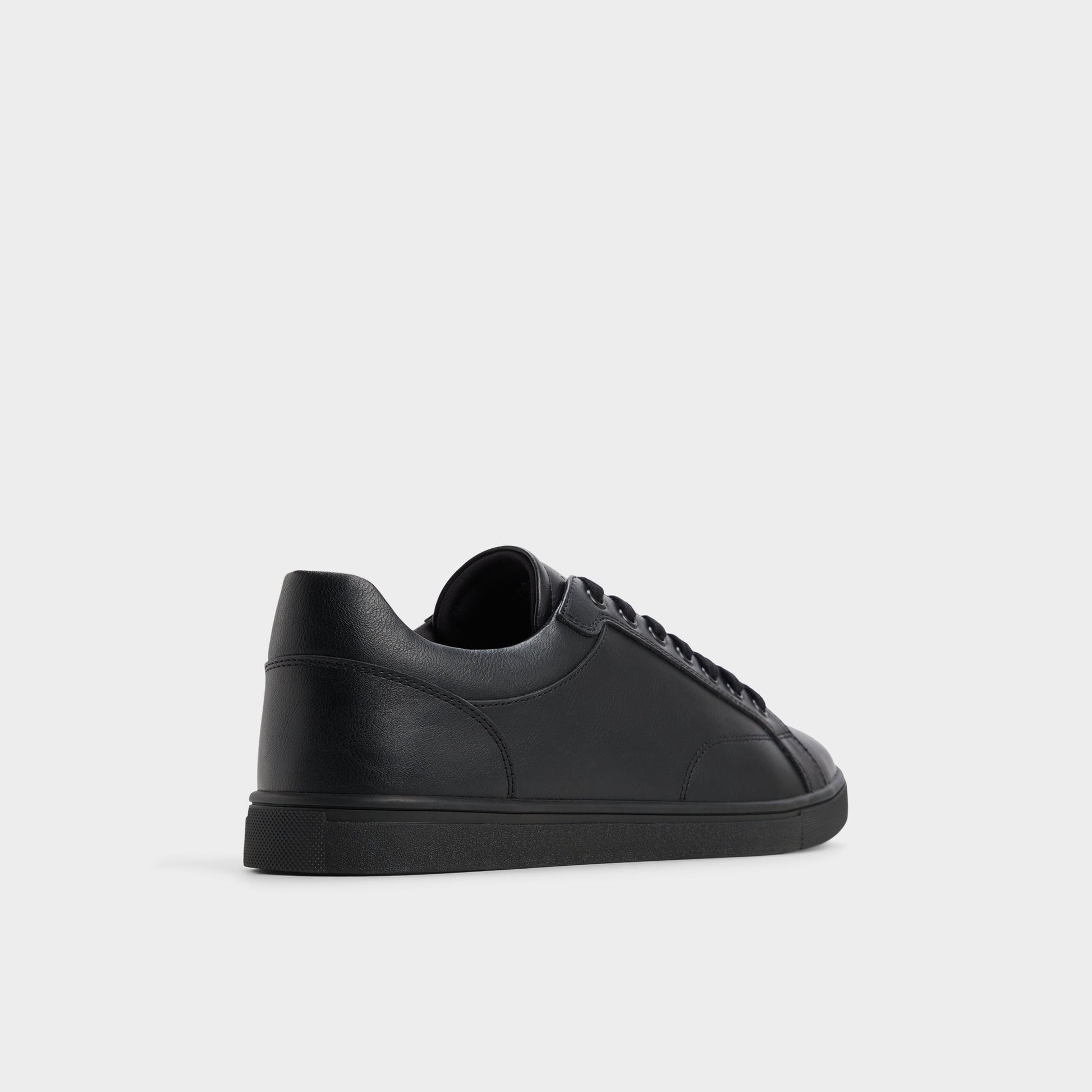 Three-quarter angle of Black/Black Poker Low top sneaker's back side