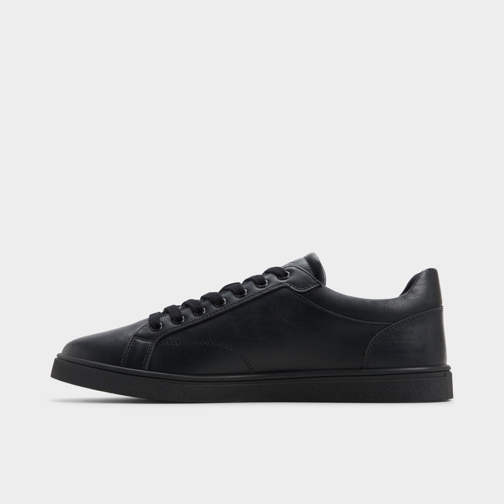 Side view of Black/Black Poker Low top sneaker