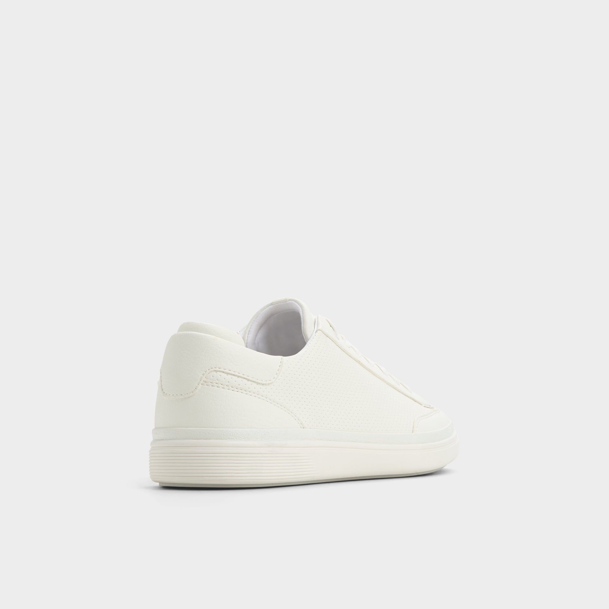 Three-quarter angle of White Stepup Low top sneaker's back side