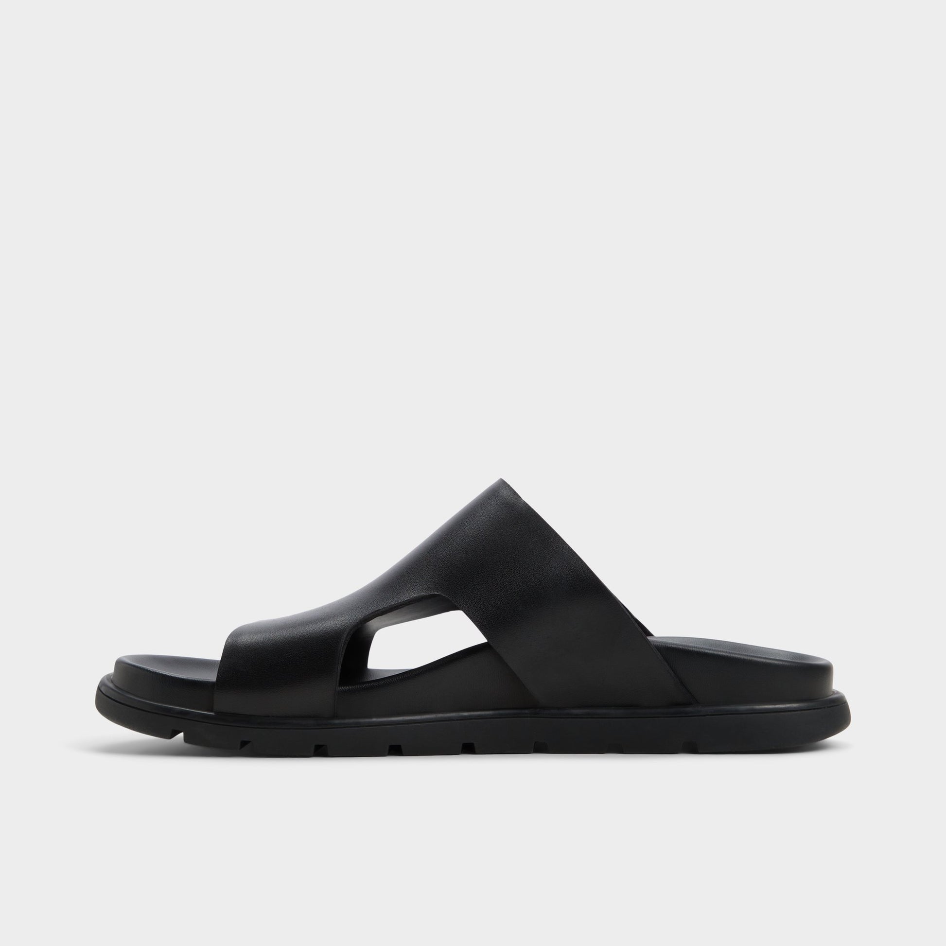 Side view of Black Soar Slide sandal
