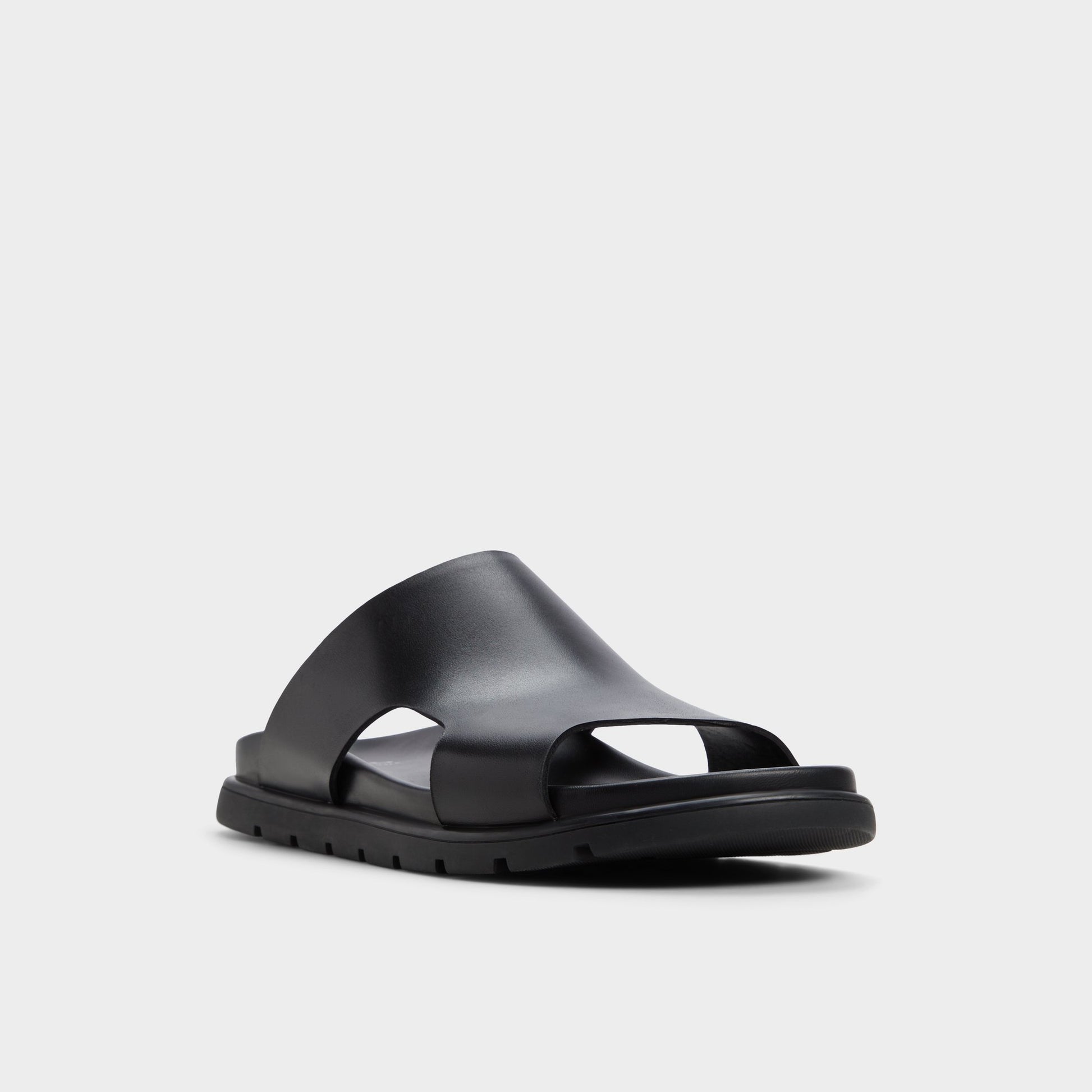 Three-quarter angle of Black Soar Slide sandal's front side