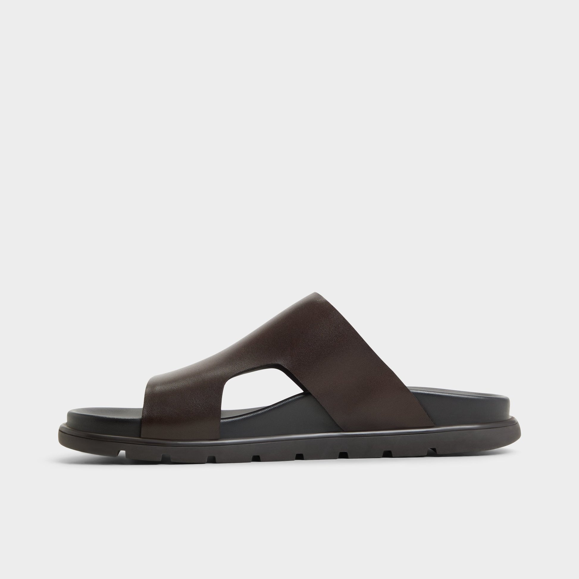 Side view of Dark Brown Soar Slide sandal