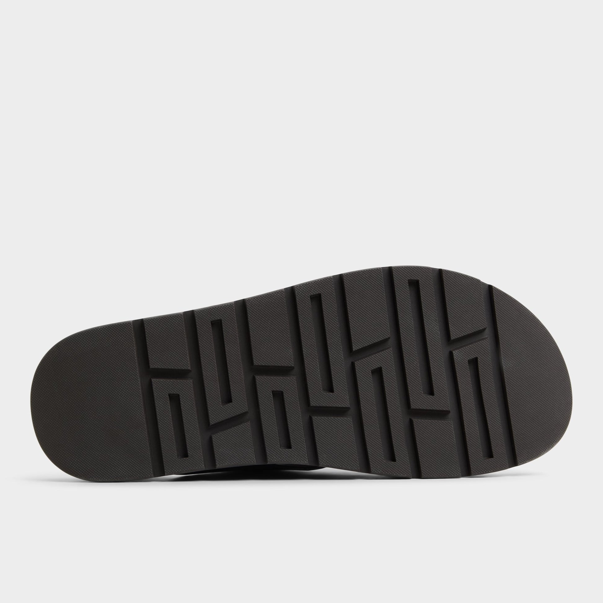 View of Dark Brown Soar Slide sandal's sole