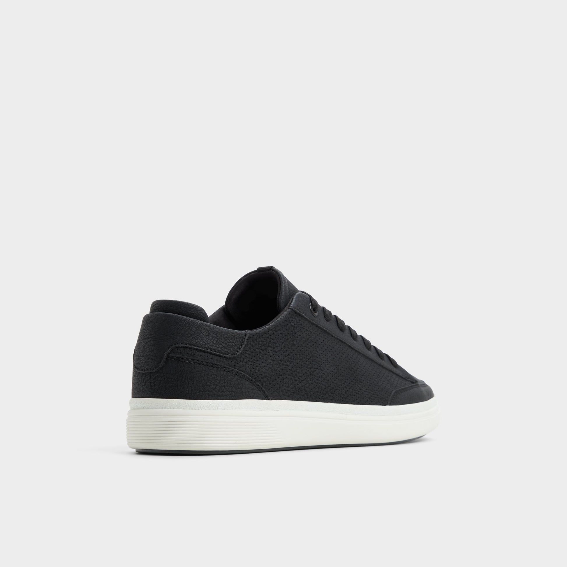 Three-quarter angle of Black Stepup Low top sneaker's back side