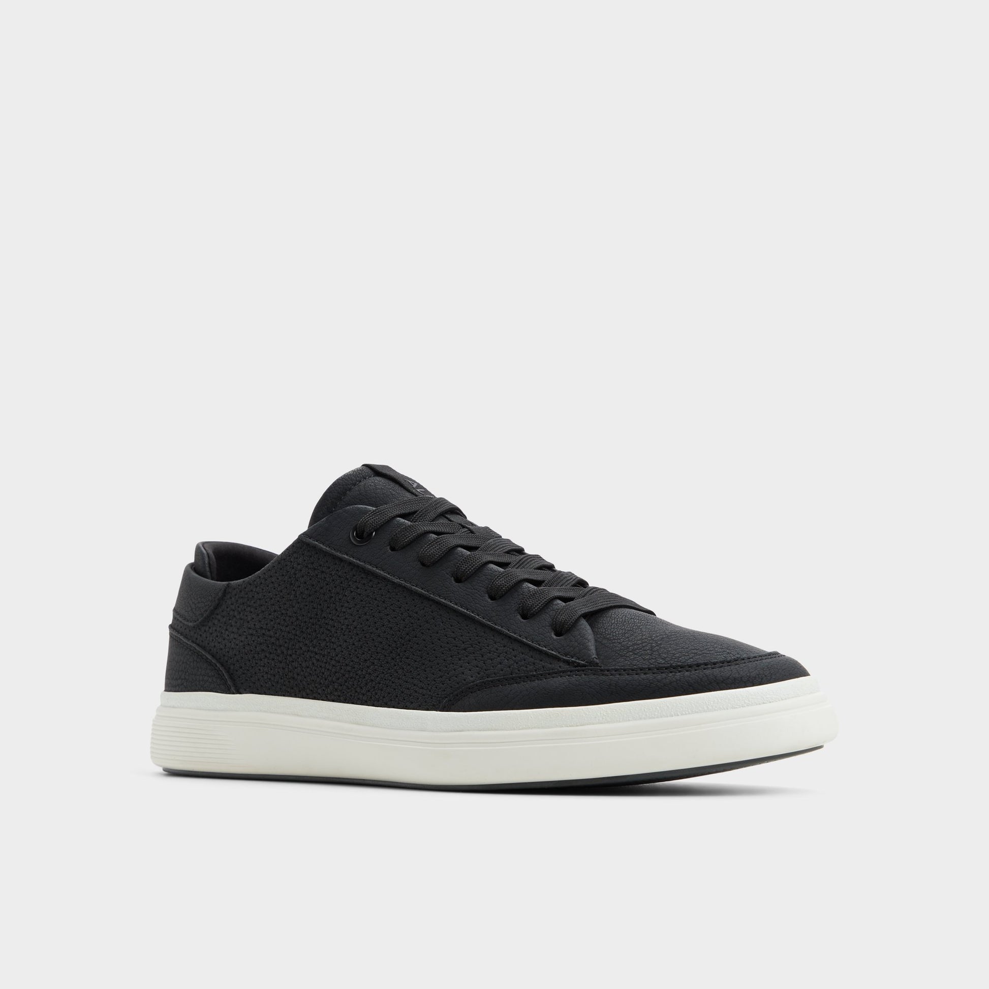 Three-quarter angle of Black Stepup Low top sneaker's front side