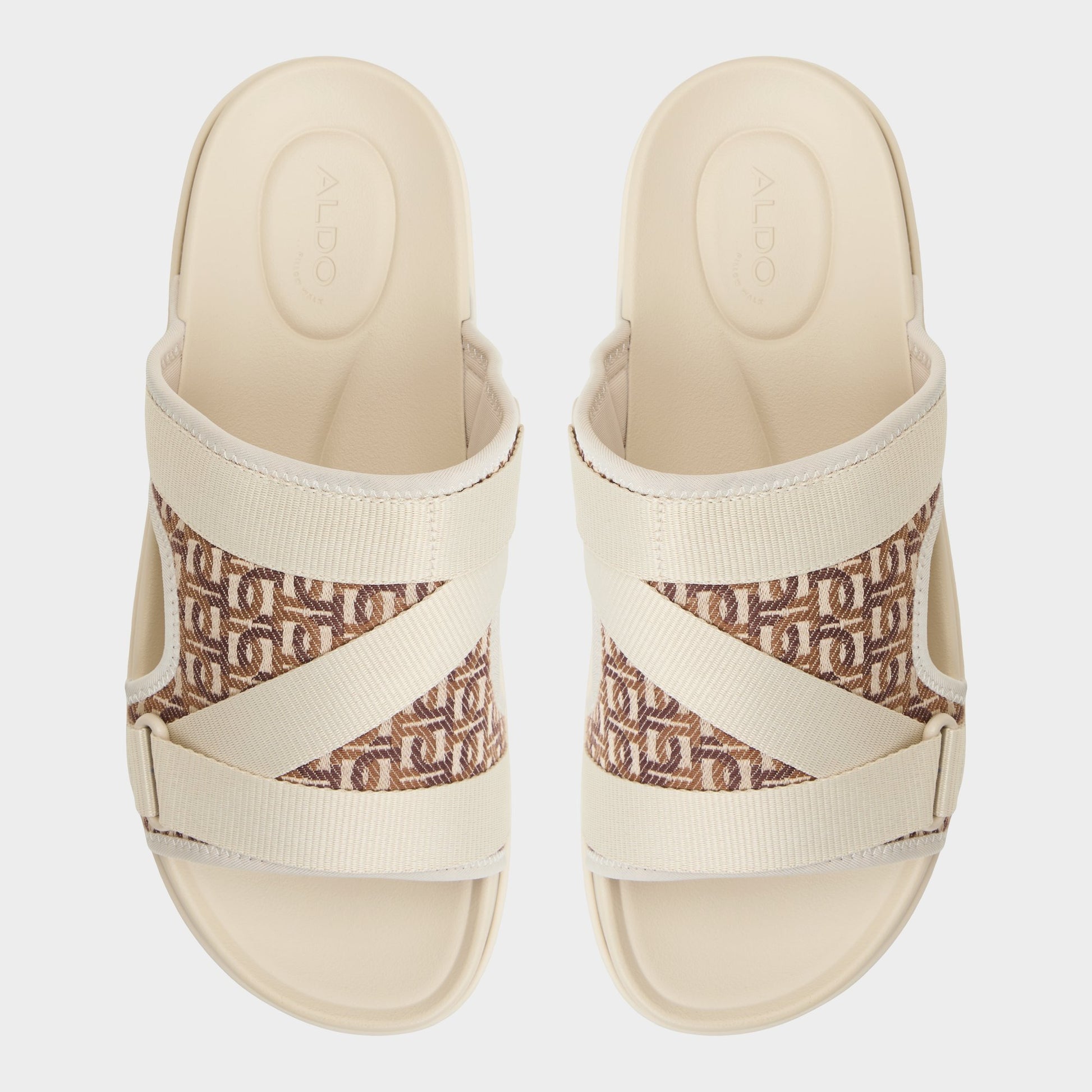 Top-down view of the Medium Beige Deniels Slide sandal