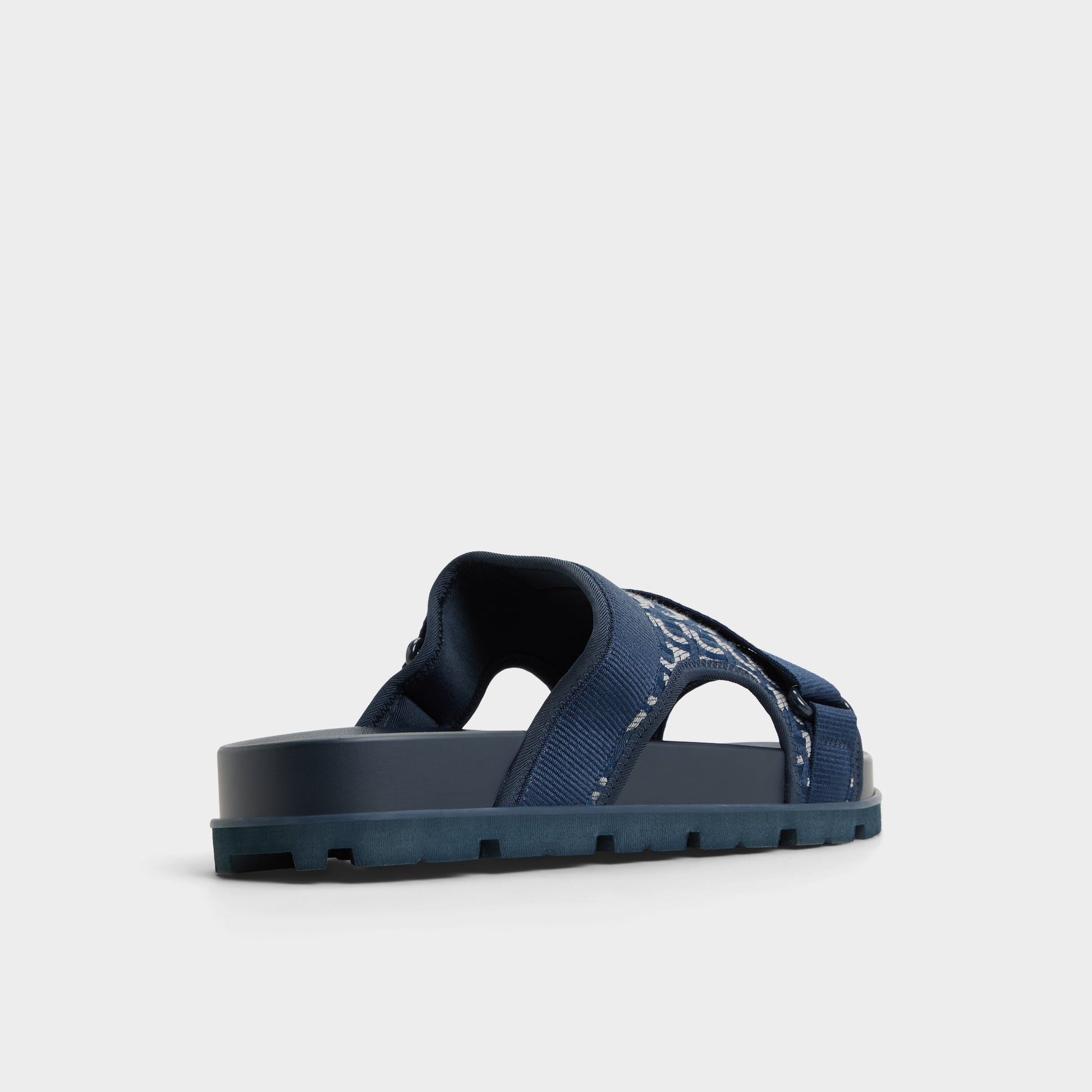 Three-quarter angle of Other Navy Deniels Slide sandal's back side