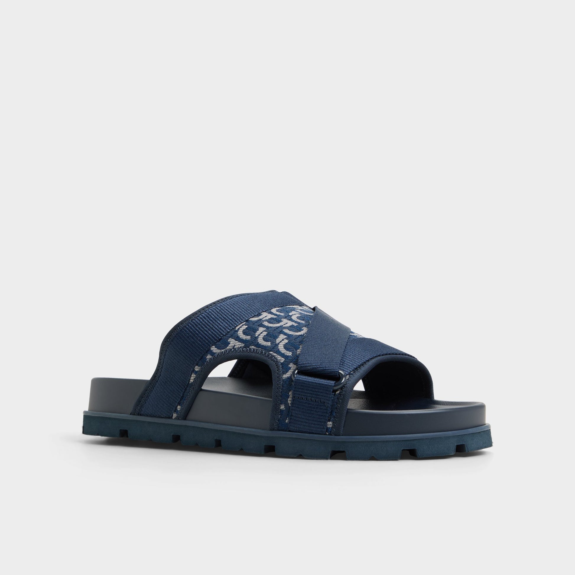 Three-quarter angle of Other Navy Deniels Slide sandal's front side