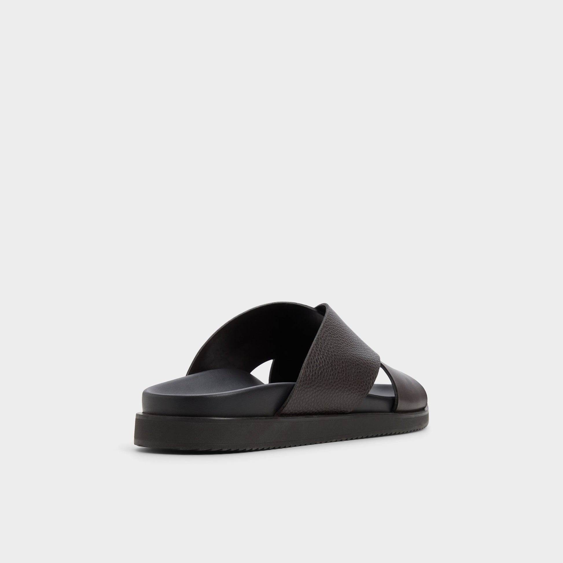Three-quarter angle of Dark Brown Darley Strappy flat sandal's back side
