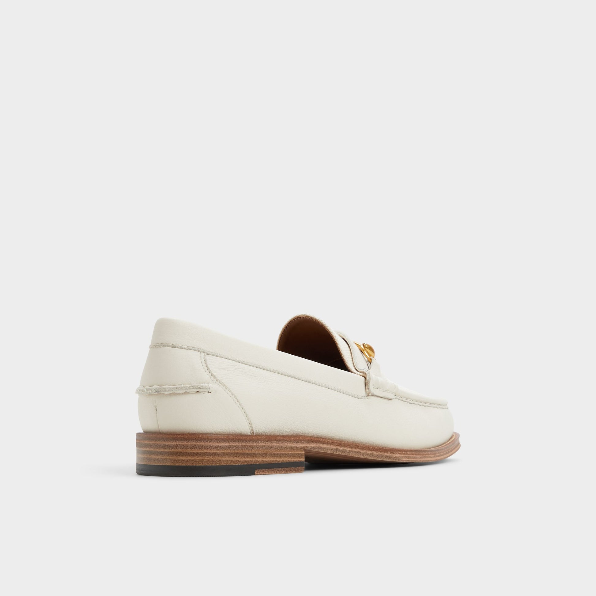 Three-quarter angle of Light Beige Wildwood Loafer's back side