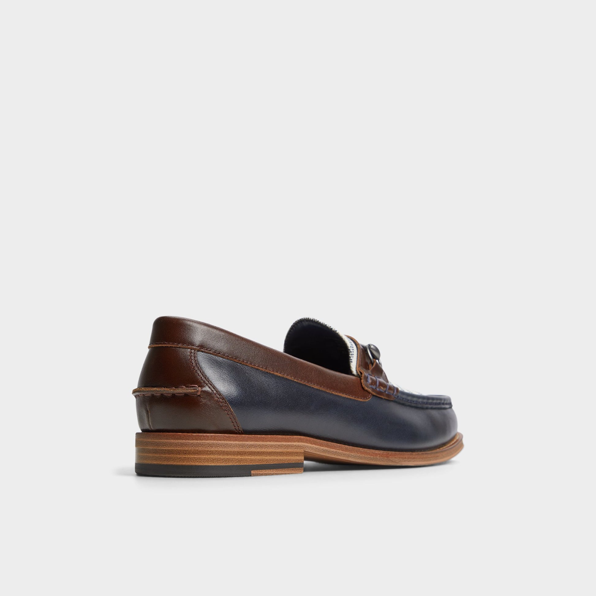 Three-quarter angle of Navy Wildwood Loafer's back side