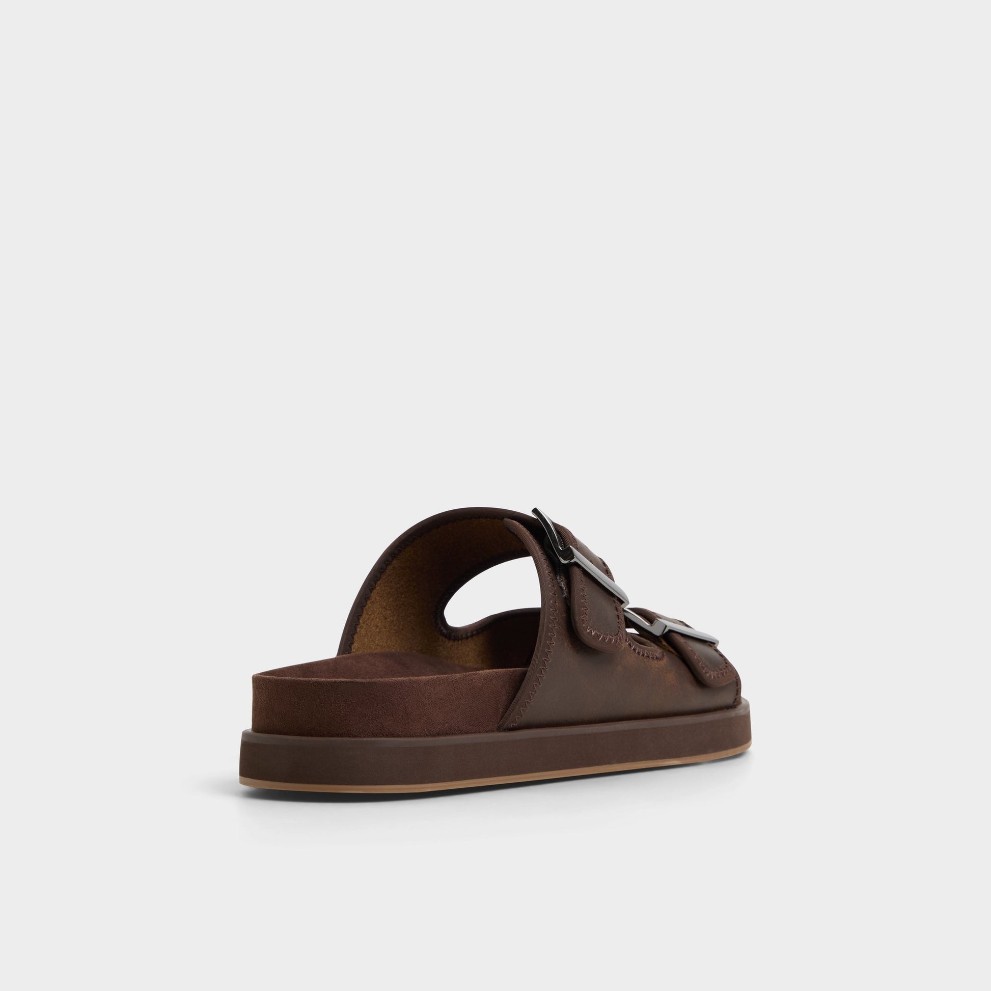 Three-quarter angle of Dark Brown Sunnyside Slide sandal's back side