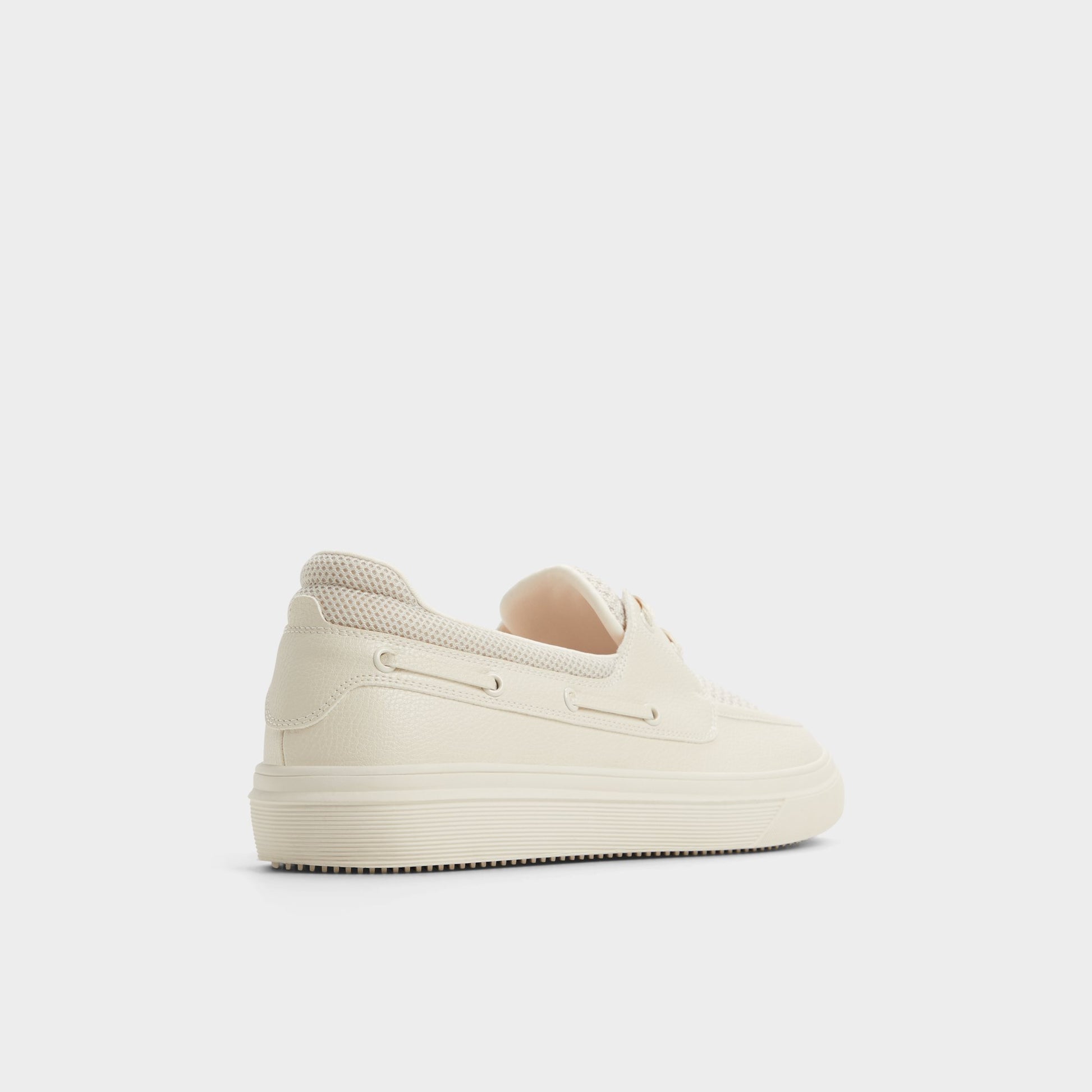 Three-quarter angle of Beige Wildwave Boat shoe's back side