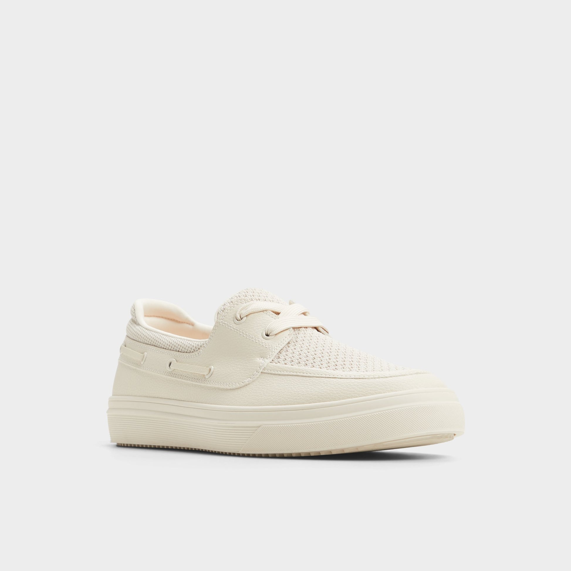 Three-quarter angle of Beige Wildwave Boat shoe's front side