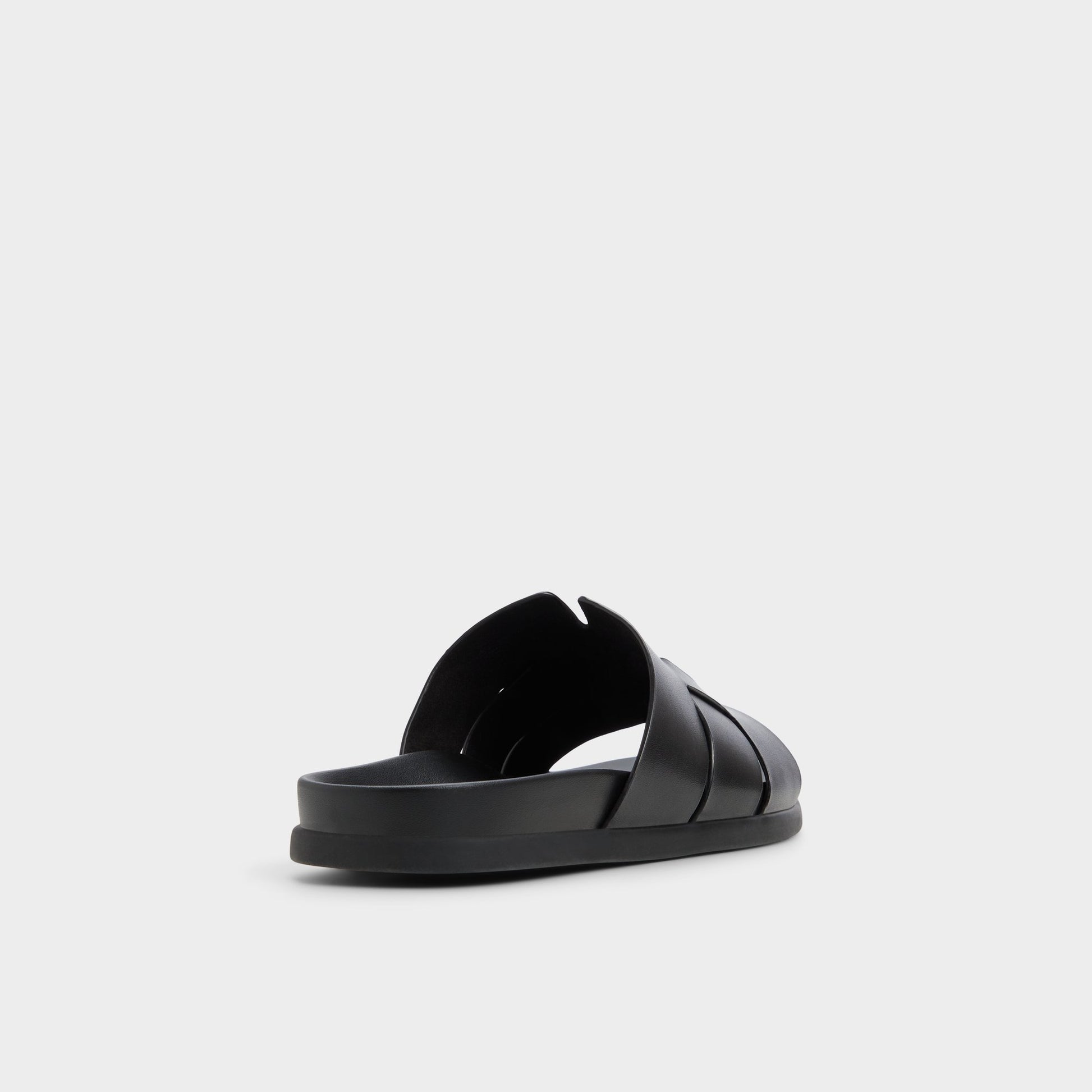Three-quarter angle of Black Padien Slide sandal's back side