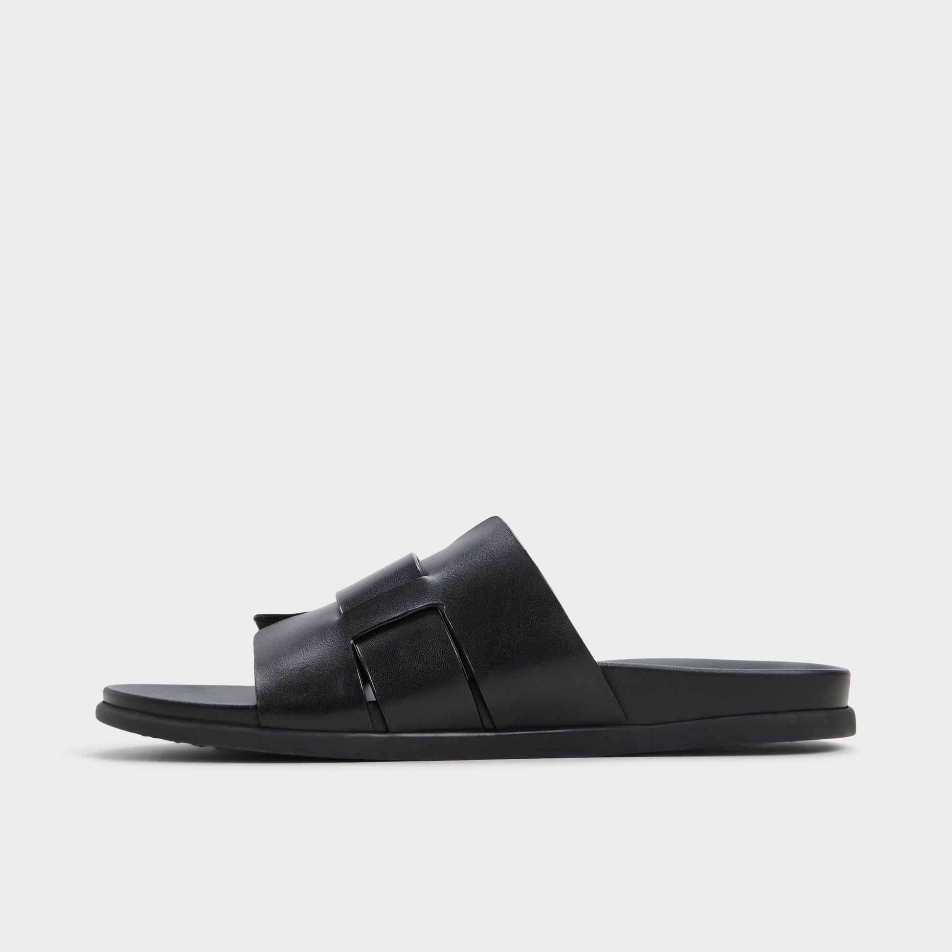 Side view of Black Padien Slide sandal