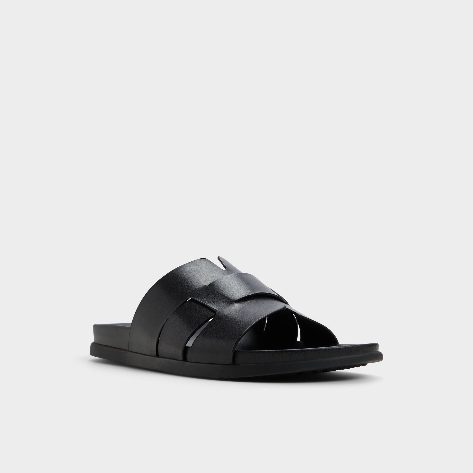 Three-quarter angle of Black Padien Slide sandal's front side