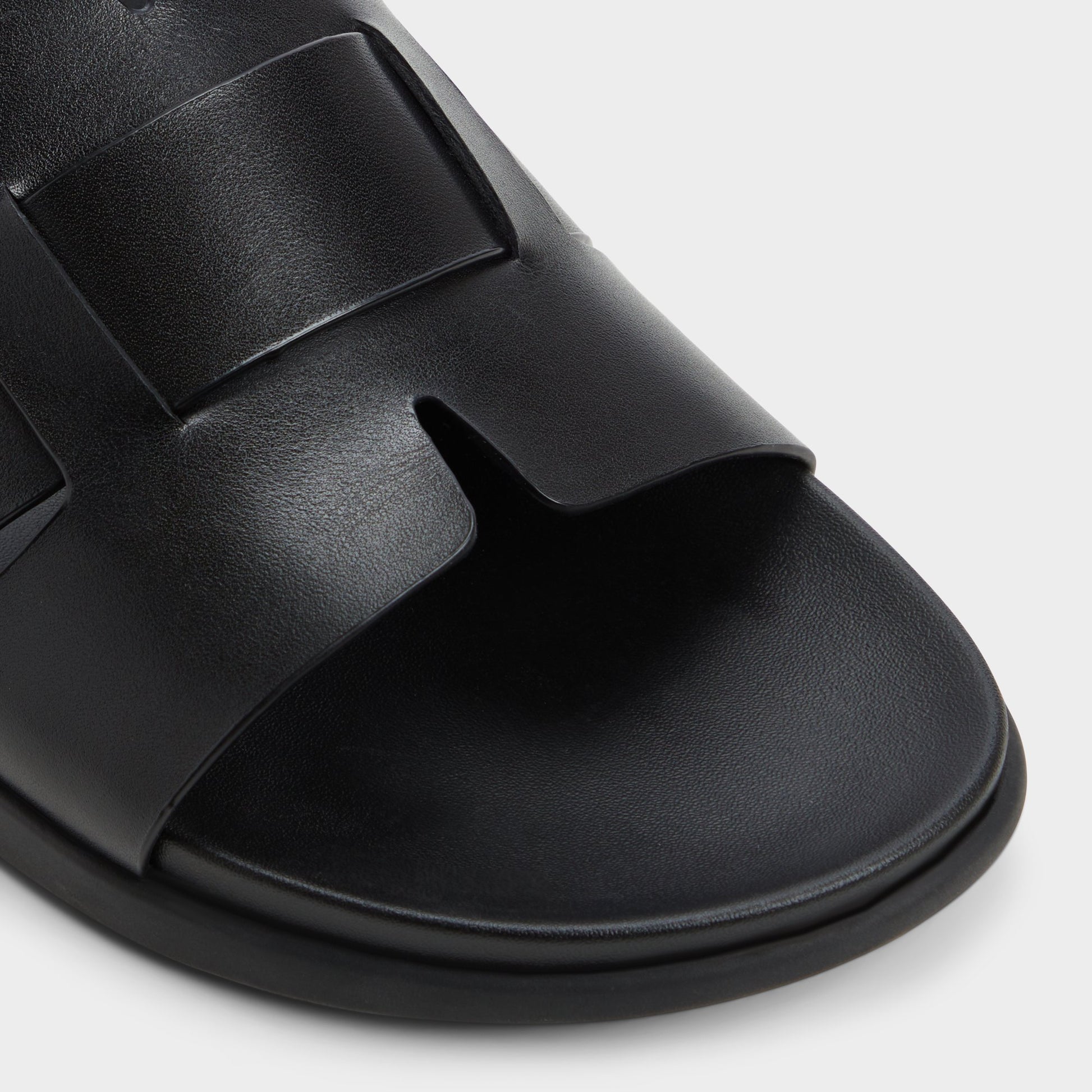 Close-up of the Black Padien Slide sandal