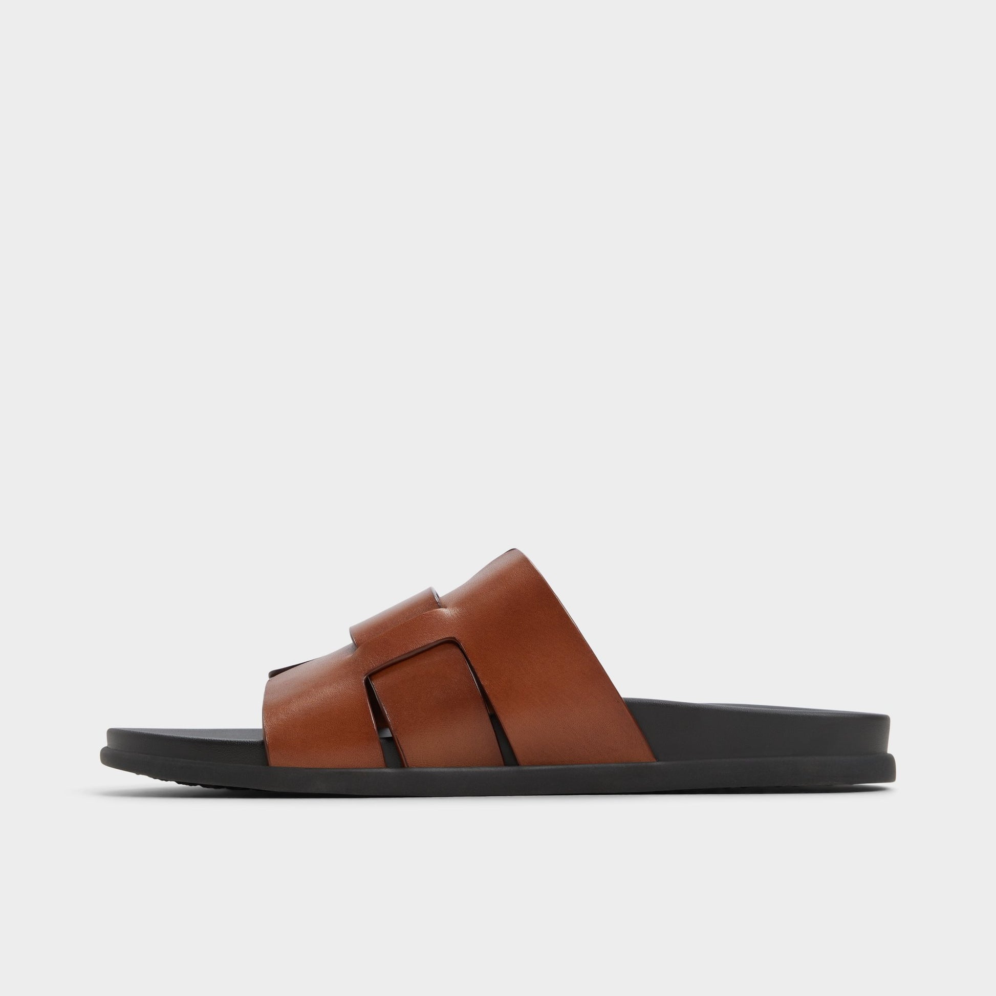 Side view of Cognac Padien Slide sandal