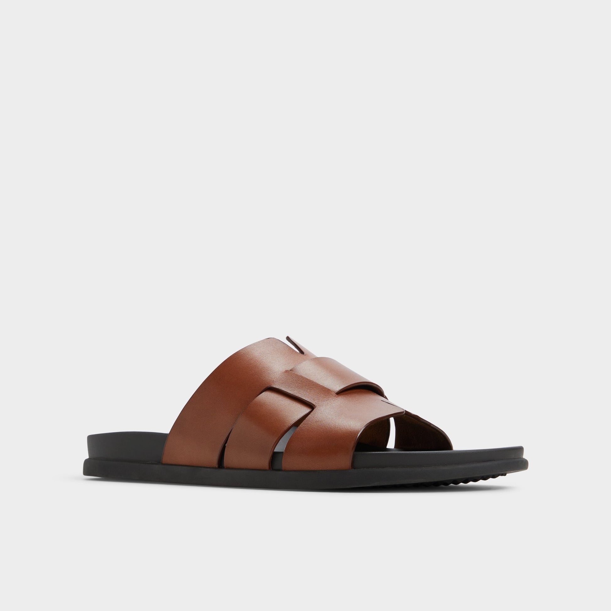 Three-quarter angle of Cognac Padien Slide sandal's front side
