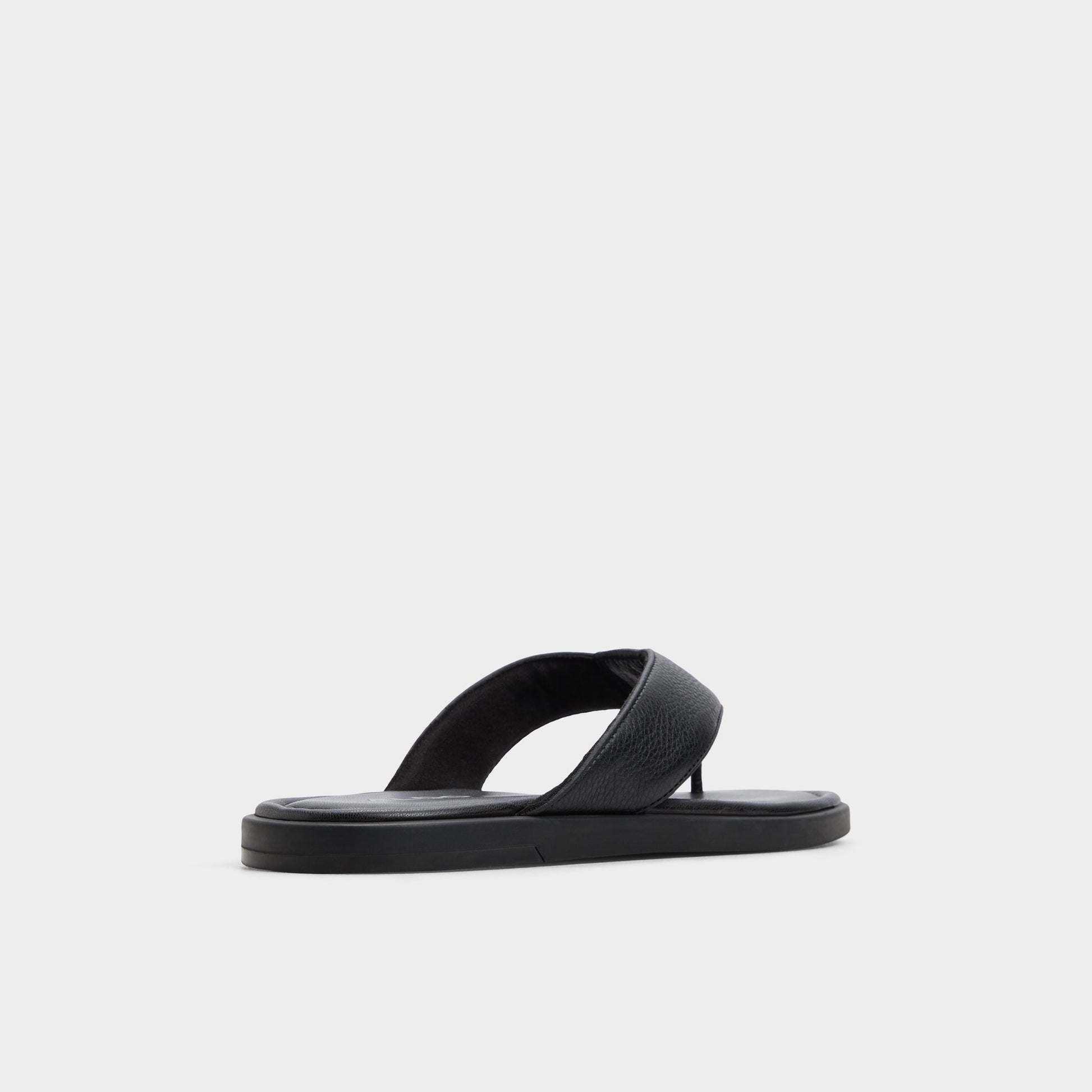 Three-quarter angle of Black Tazzo Flip flop's back side