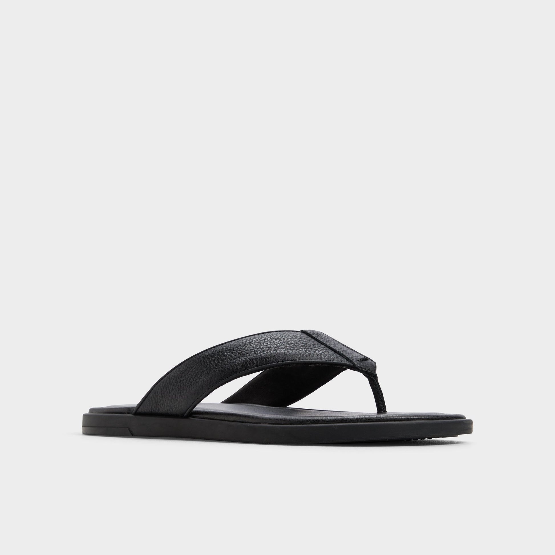 Three-quarter angle of Black Tazzo Flip flop's front side