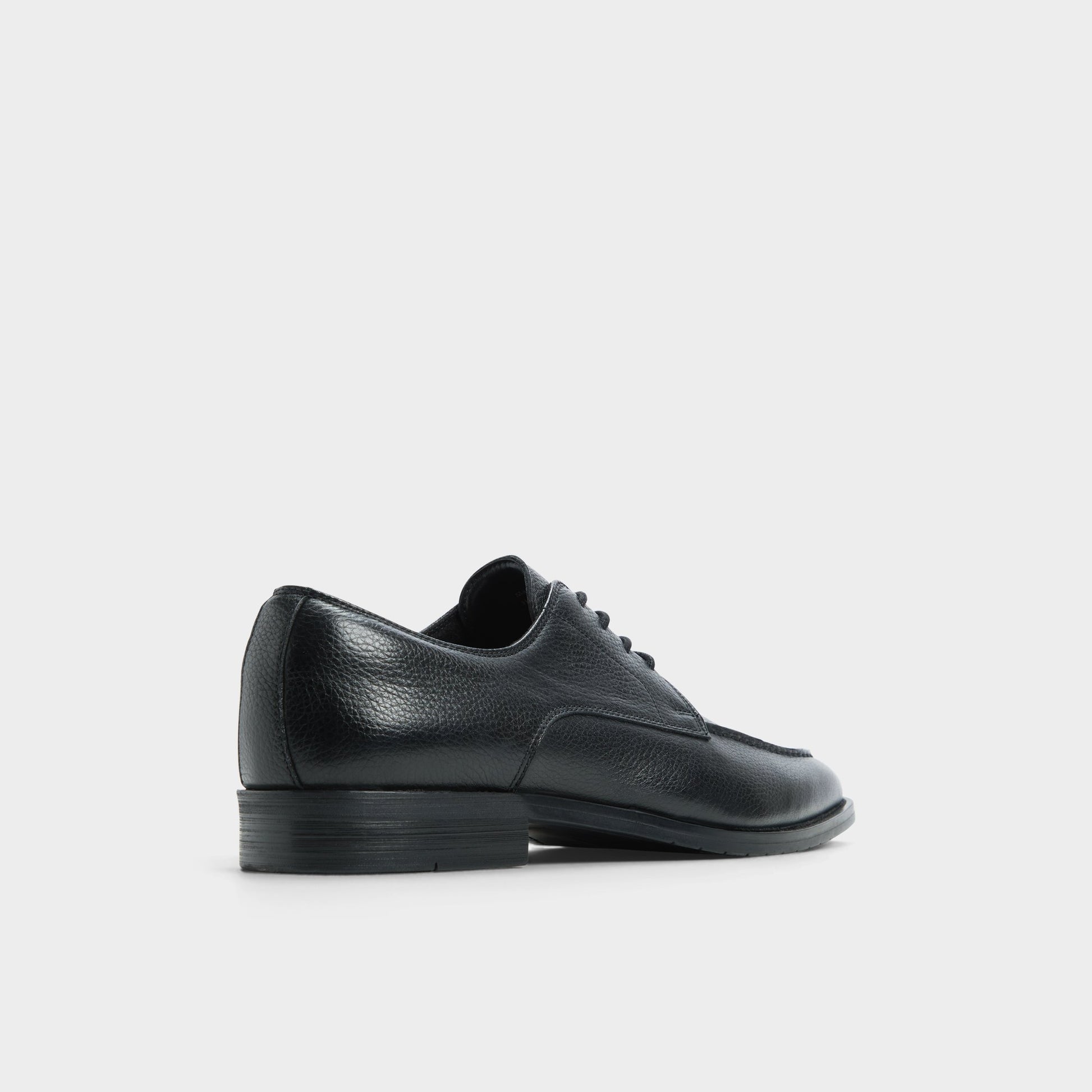 Three-quarter angle of Black Montcourt Derby shoe's back side