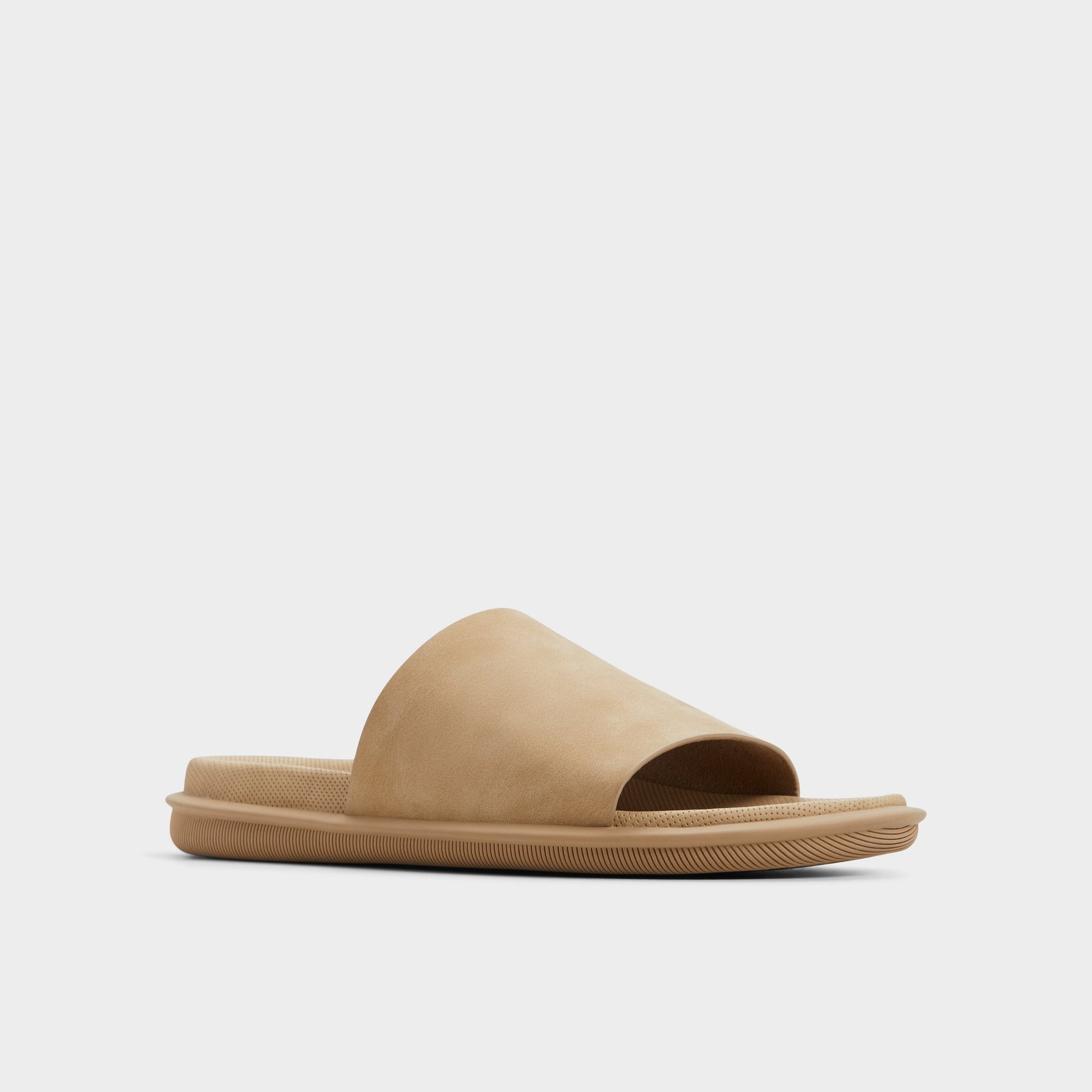 Three-quarter angle of Light Beige Galesa Slide sandal's front side