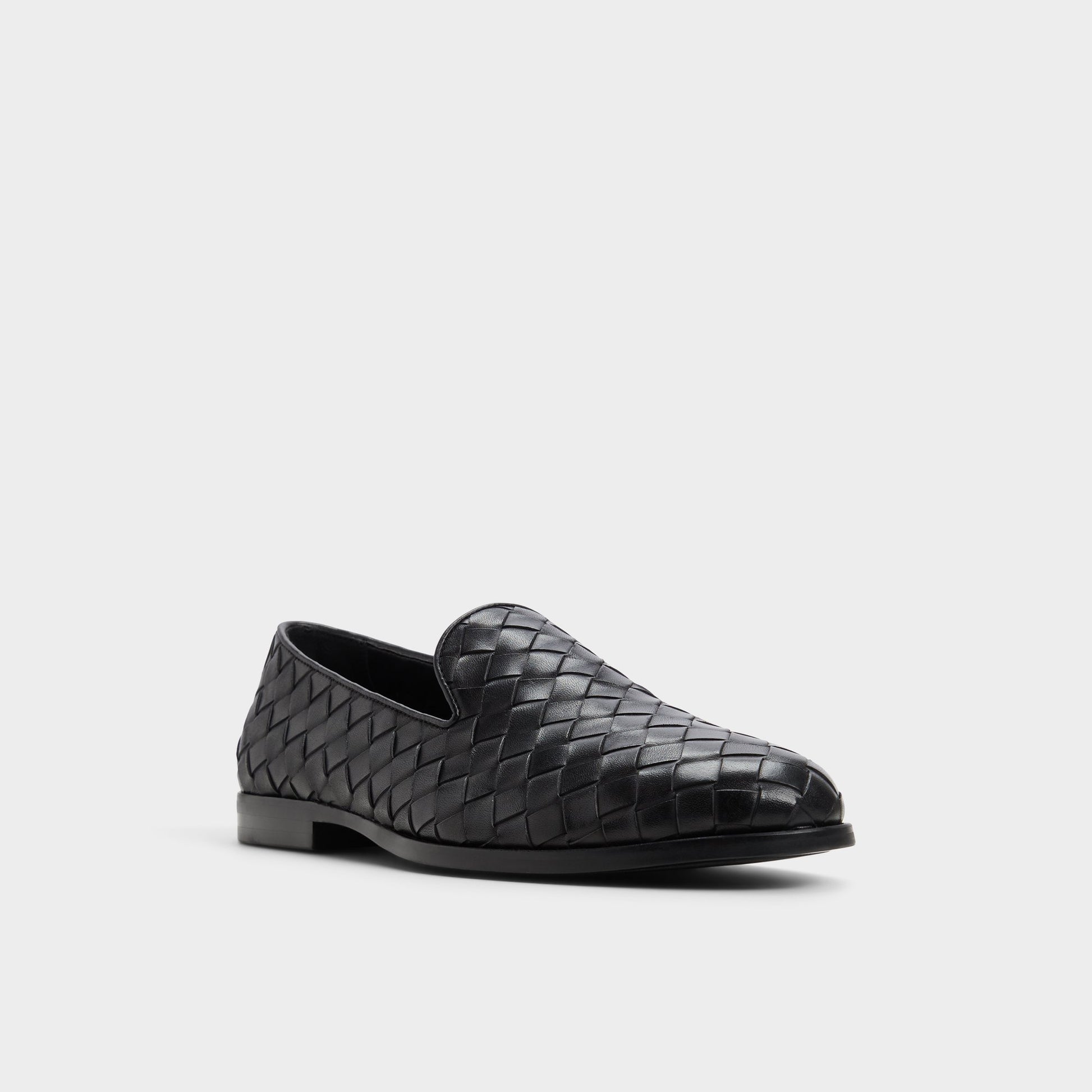 Three-quarter angle of Black/Black Casino Loafer's front side