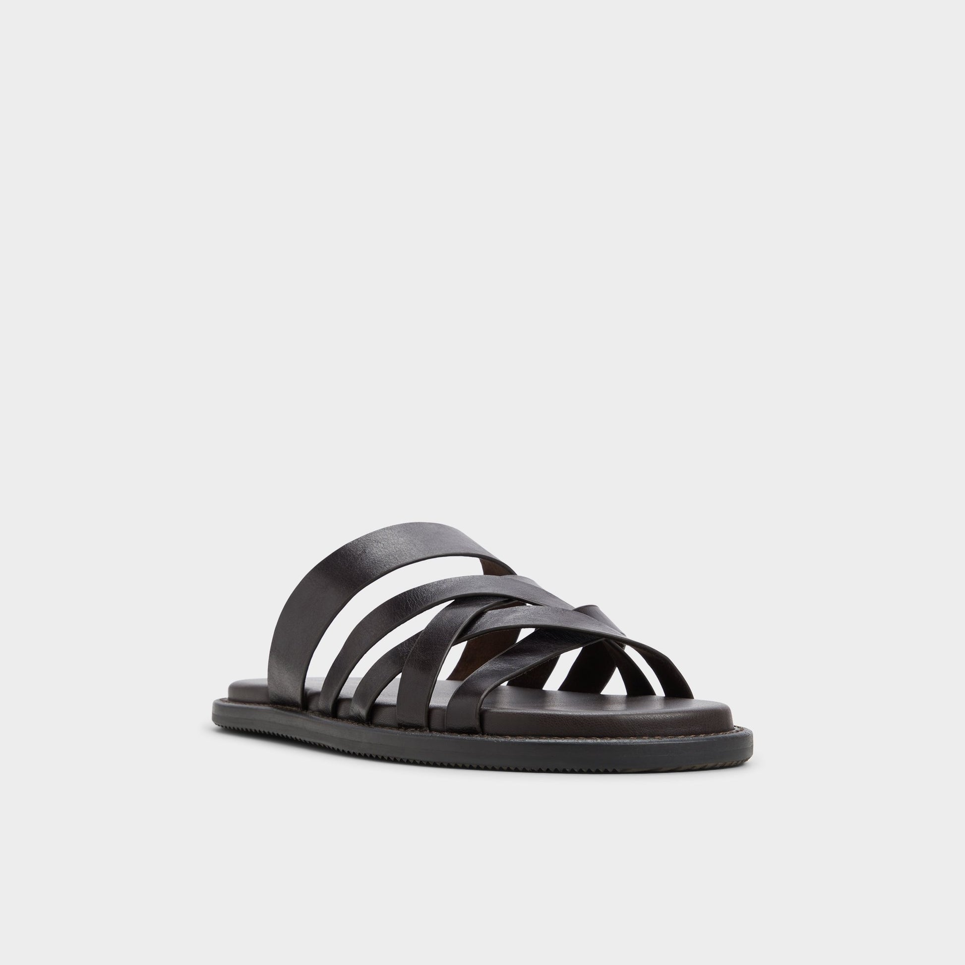 Three-quarter angle of Brown Haniff Strappy flat sandal's front side