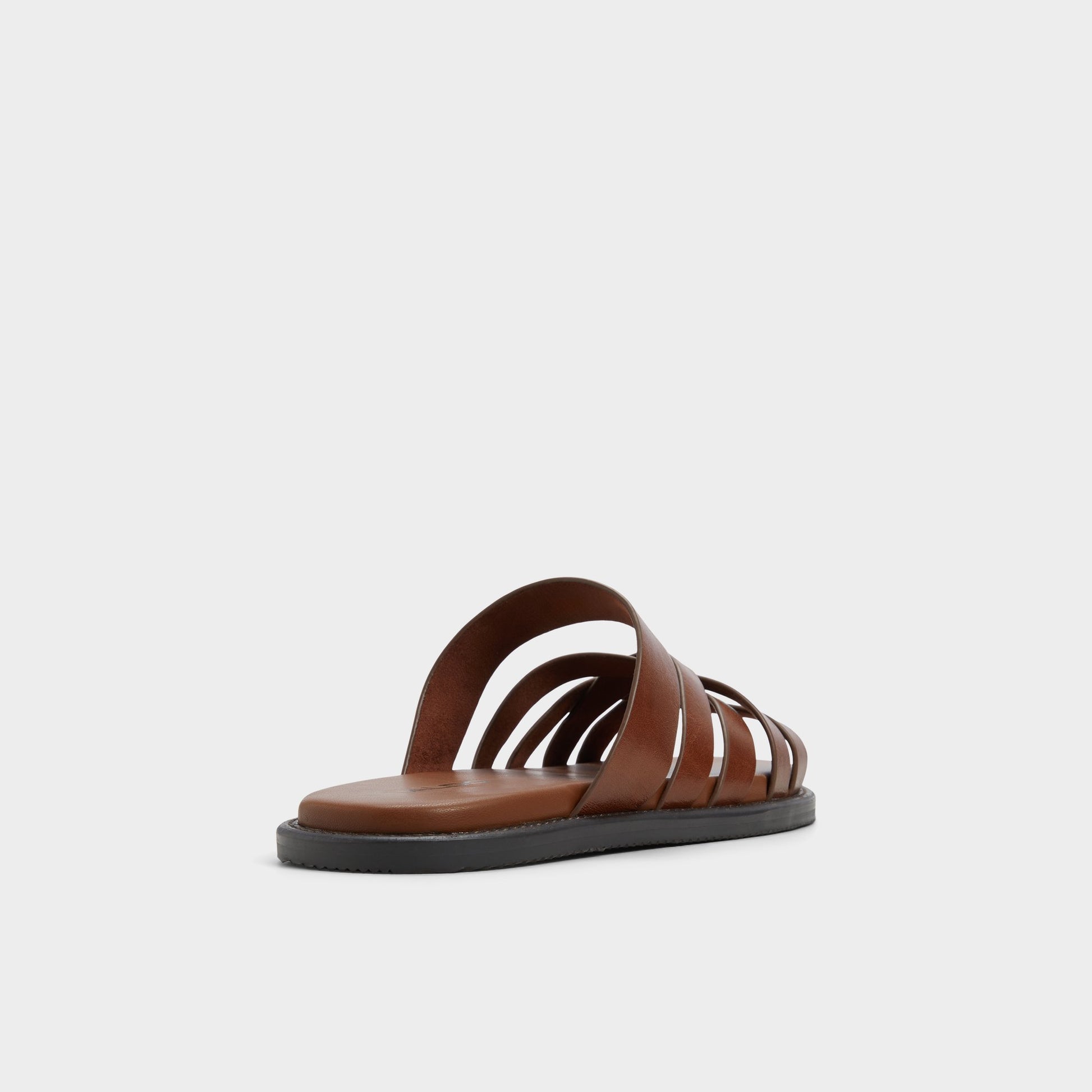 Three-quarter angle of Cognac Haniff Strappy flat sandal's back side