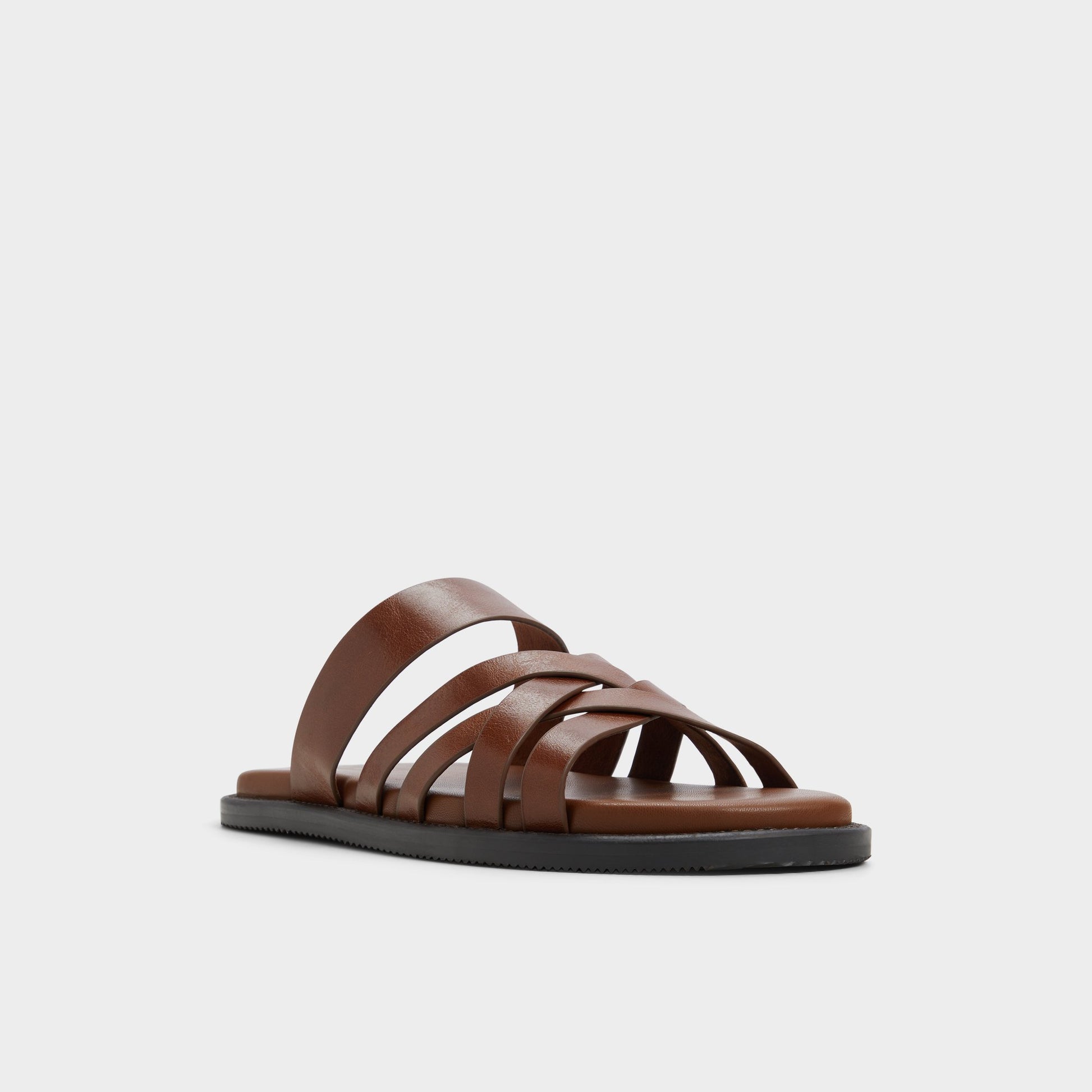 Three-quarter angle of Cognac Haniff Strappy flat sandal's front side