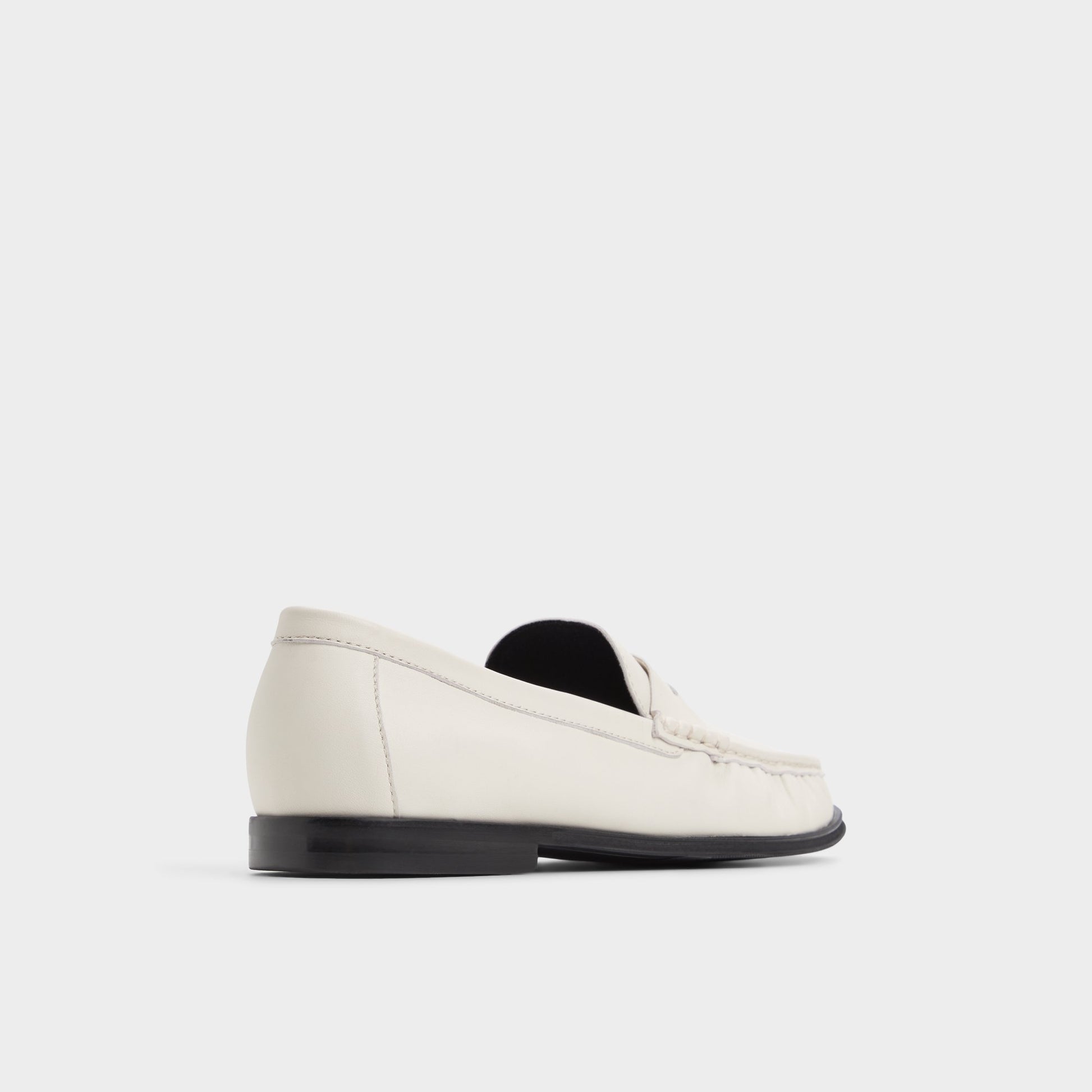 Three-quarter angle of Ivory Speakeasy Loafer's back side