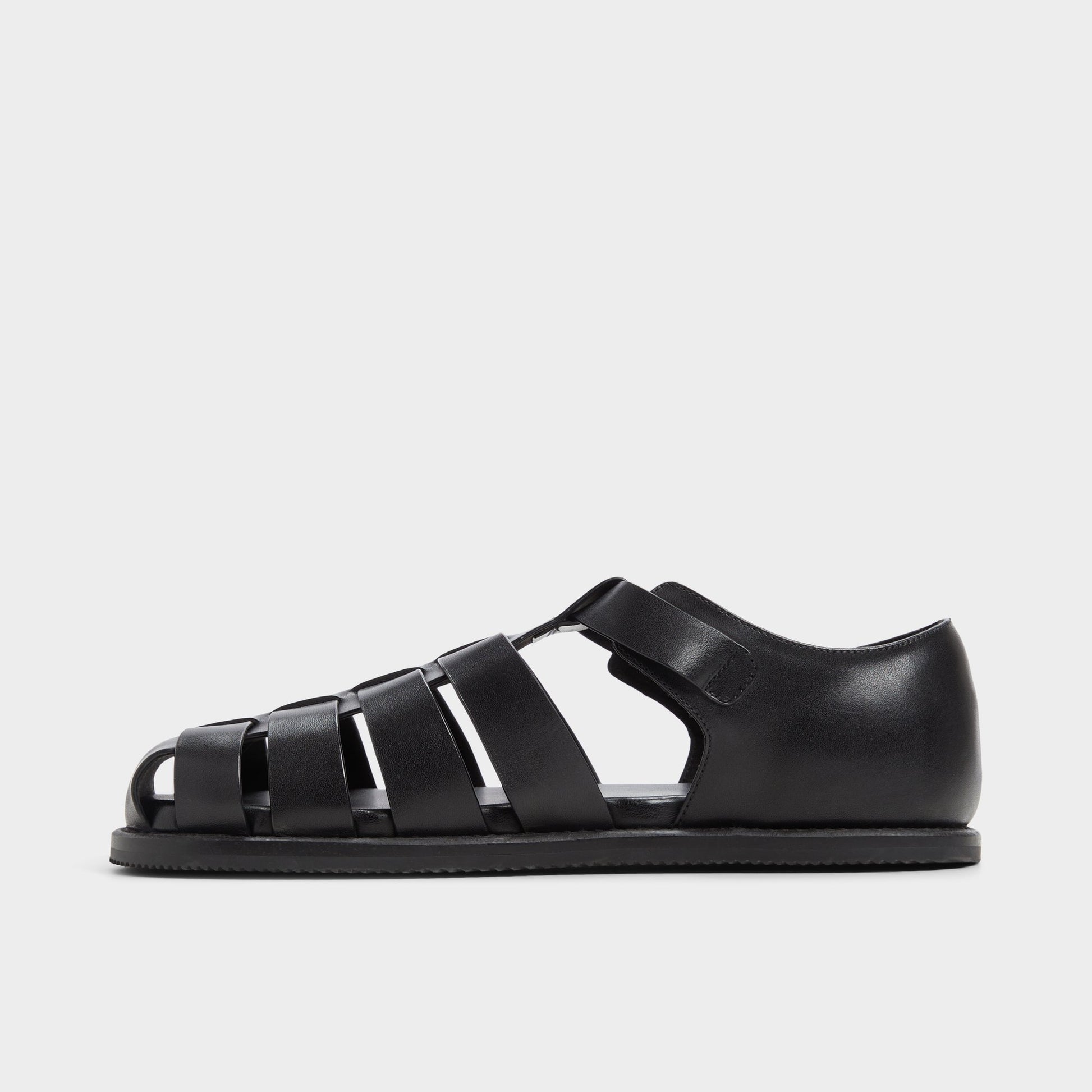 Side view of Black Wildhaven Flat sandal