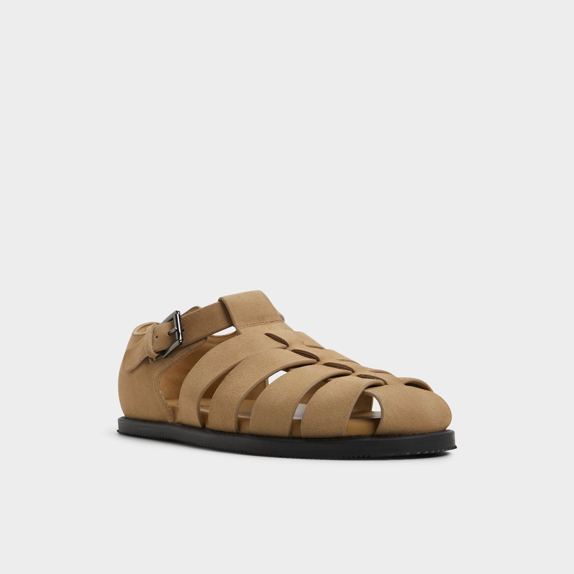 Three-quarter angle of Taupe Wildhaven Flat sandal's front side