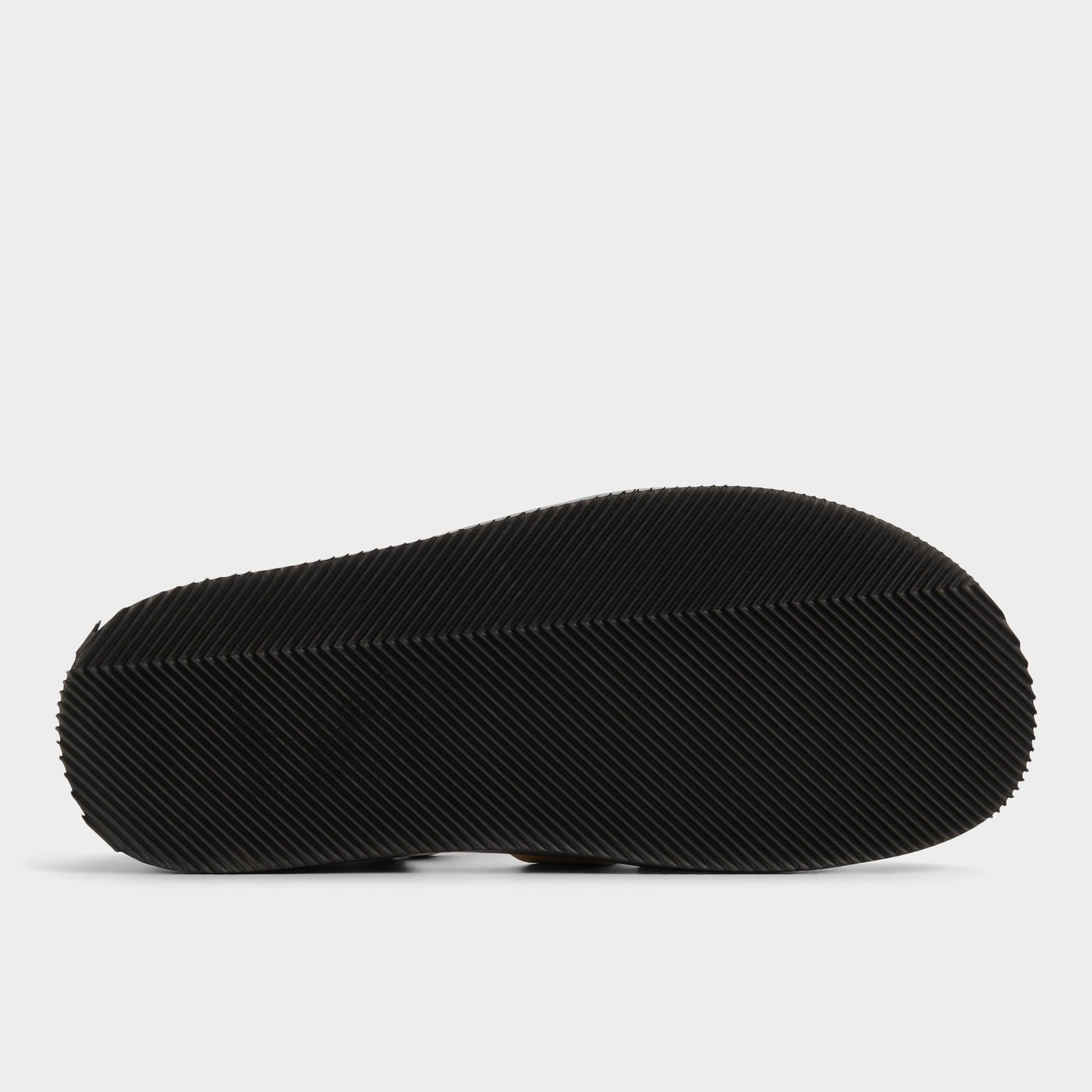 View of Taupe Wildhaven Flat sandal's sole