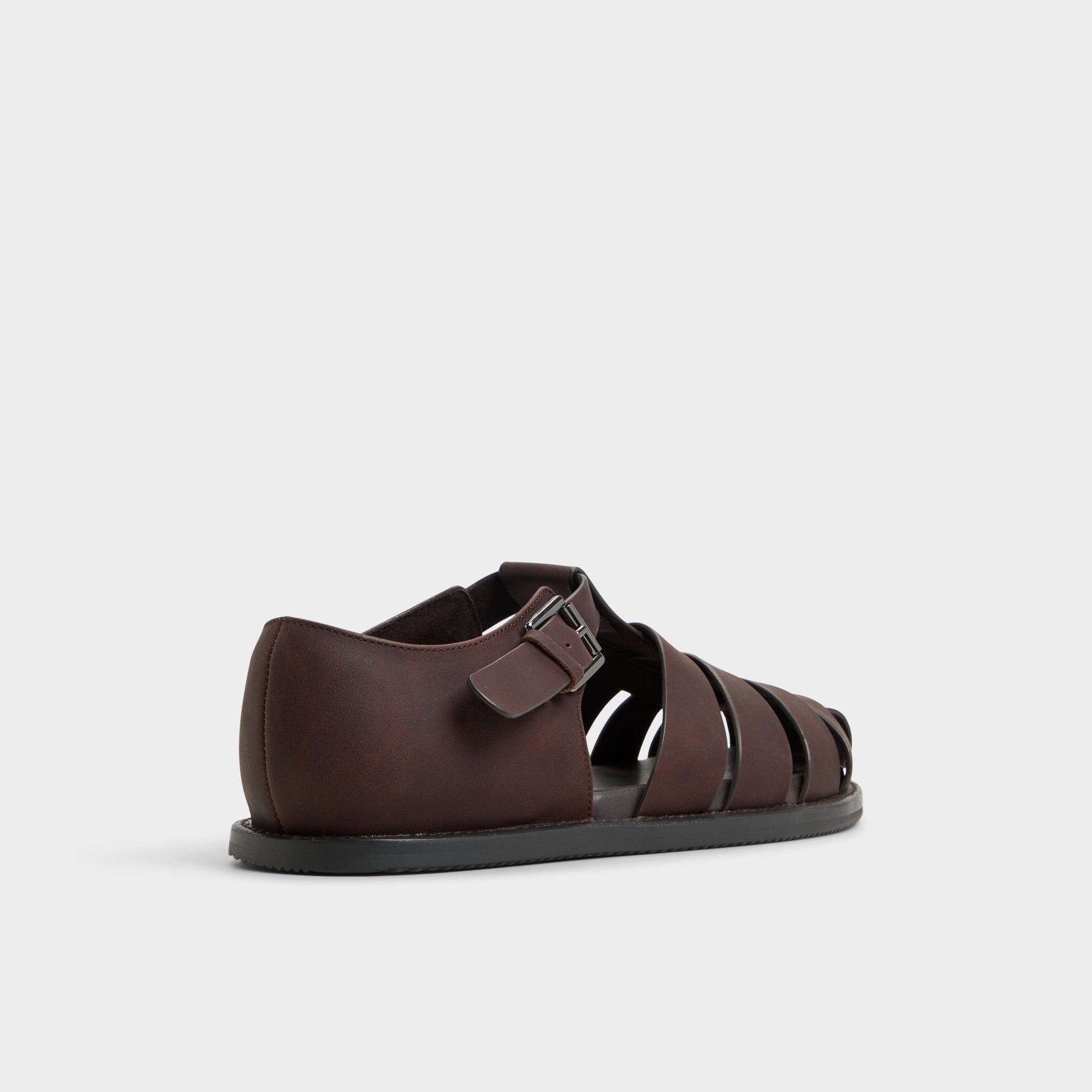 Three-quarter angle of Brown Overflow Wildhaven Flat sandal's back side