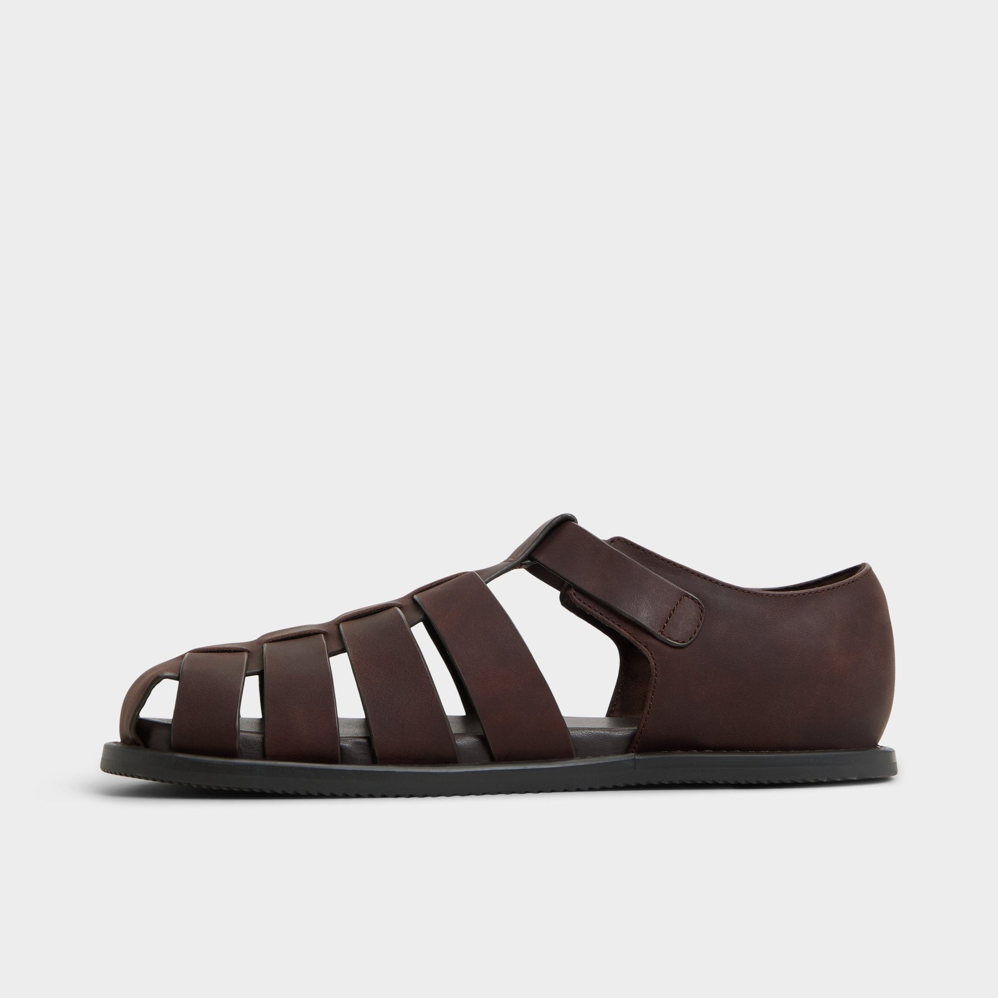 Side view of Brown Overflow Wildhaven Flat sandal