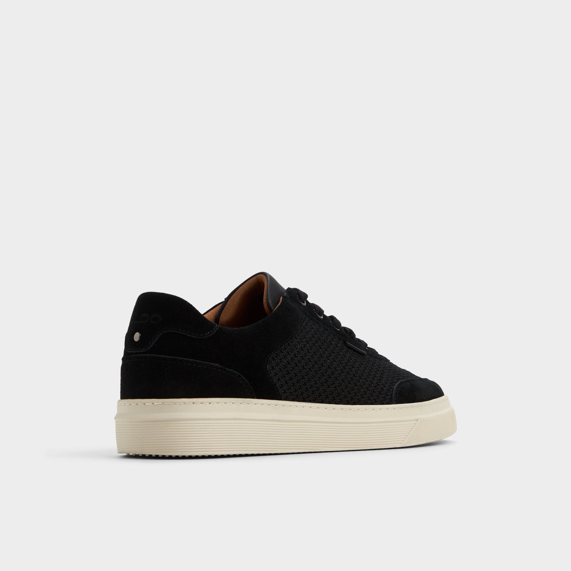 Three-quarter angle of Open Black Mcenroe Low top sneaker's back side