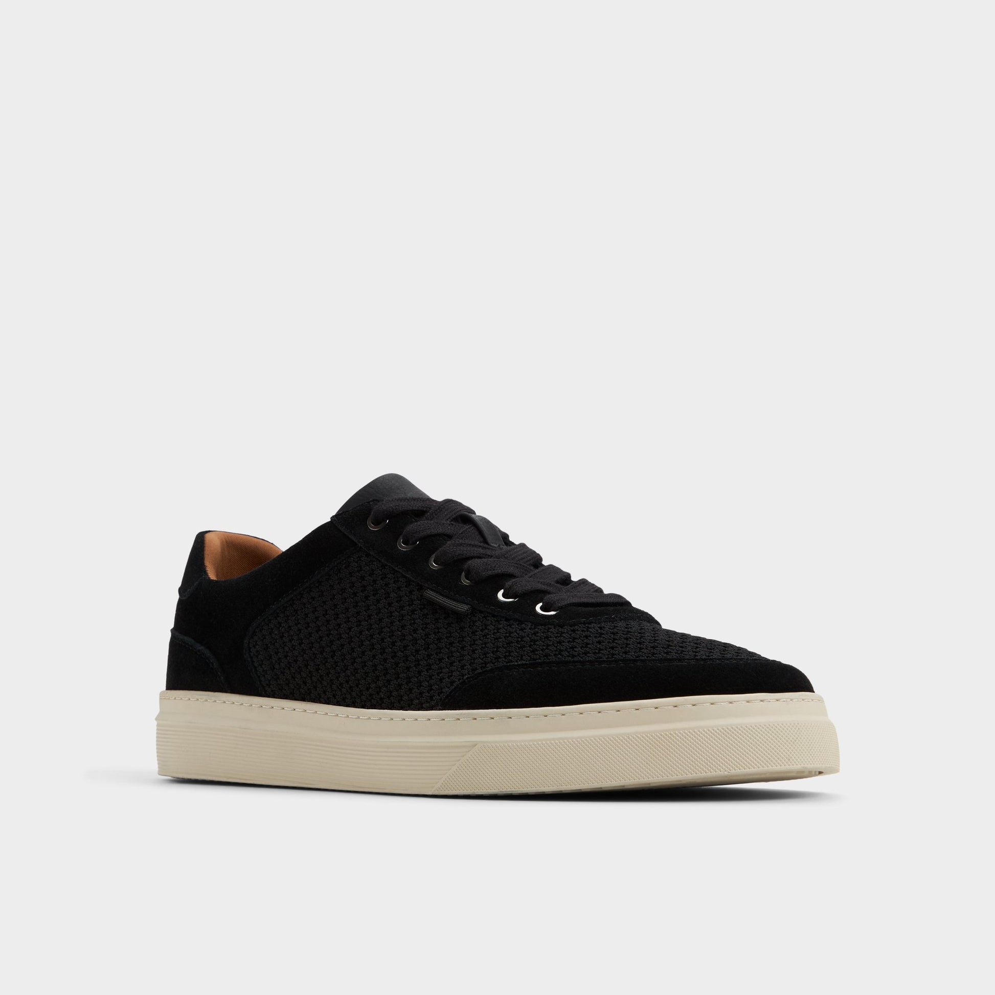 Three-quarter angle of Open Black Mcenroe Low top sneaker's front side