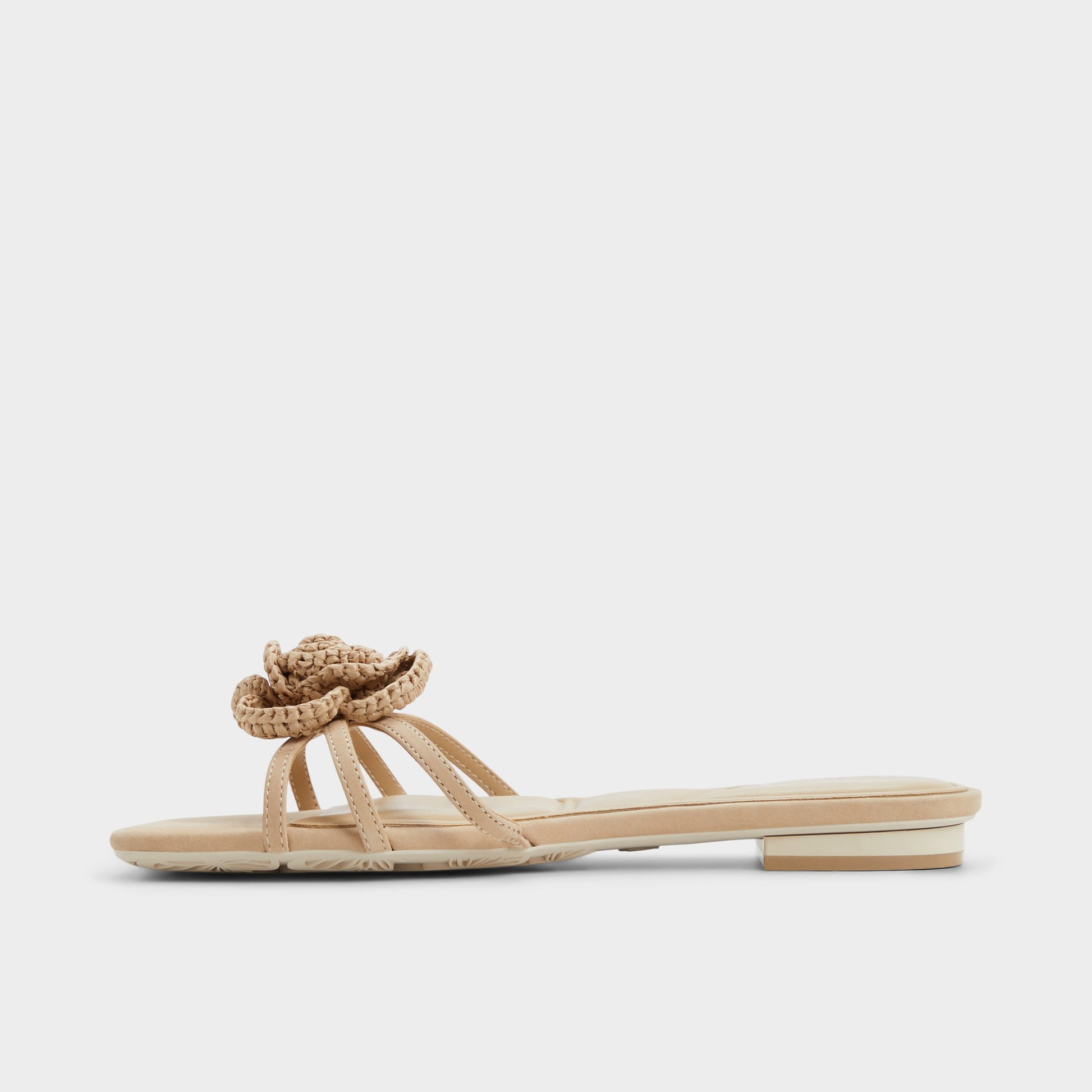Side view of Sand Wildbloom Strappy flat sandal