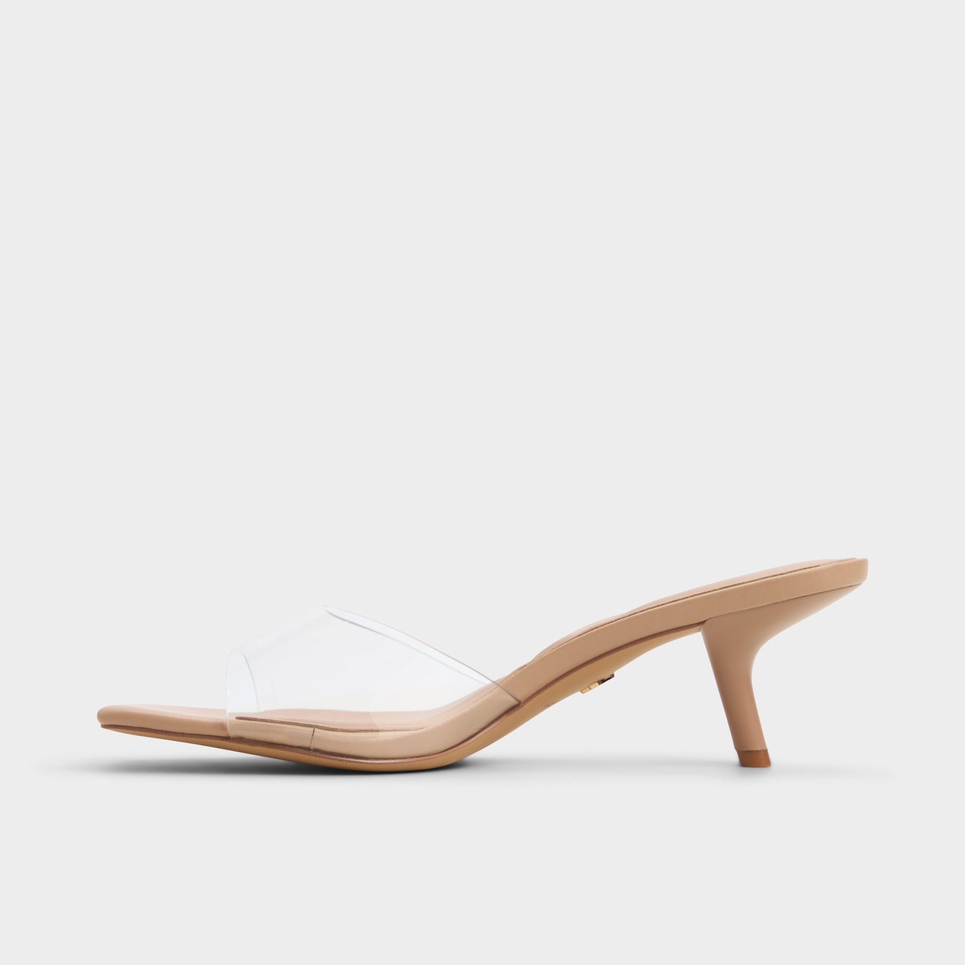 Side view of Tan Enchanting Heeled mule