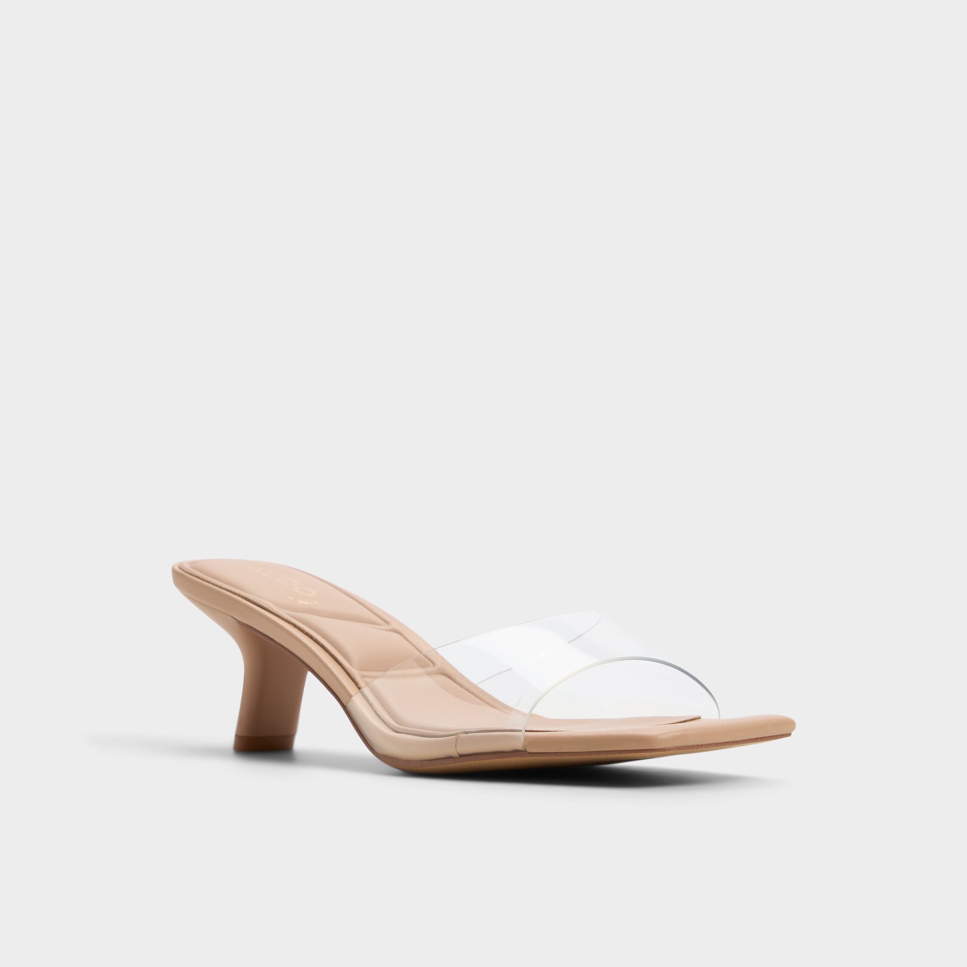 Three-quarter angle of Tan Enchanting Heeled mule's front side