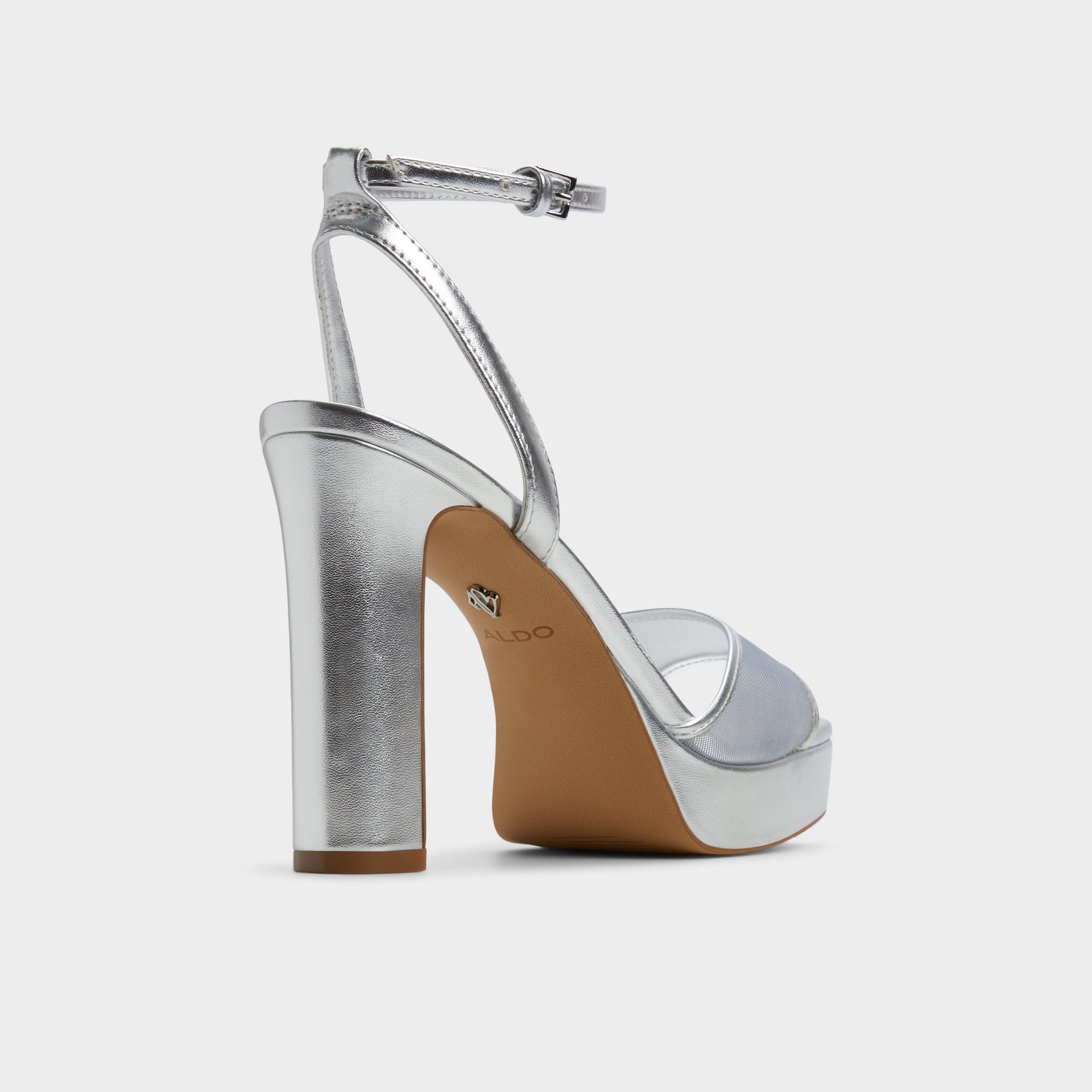 Three-quarter angle of Silver Chicglimmer Strappy heeled sandal's back side