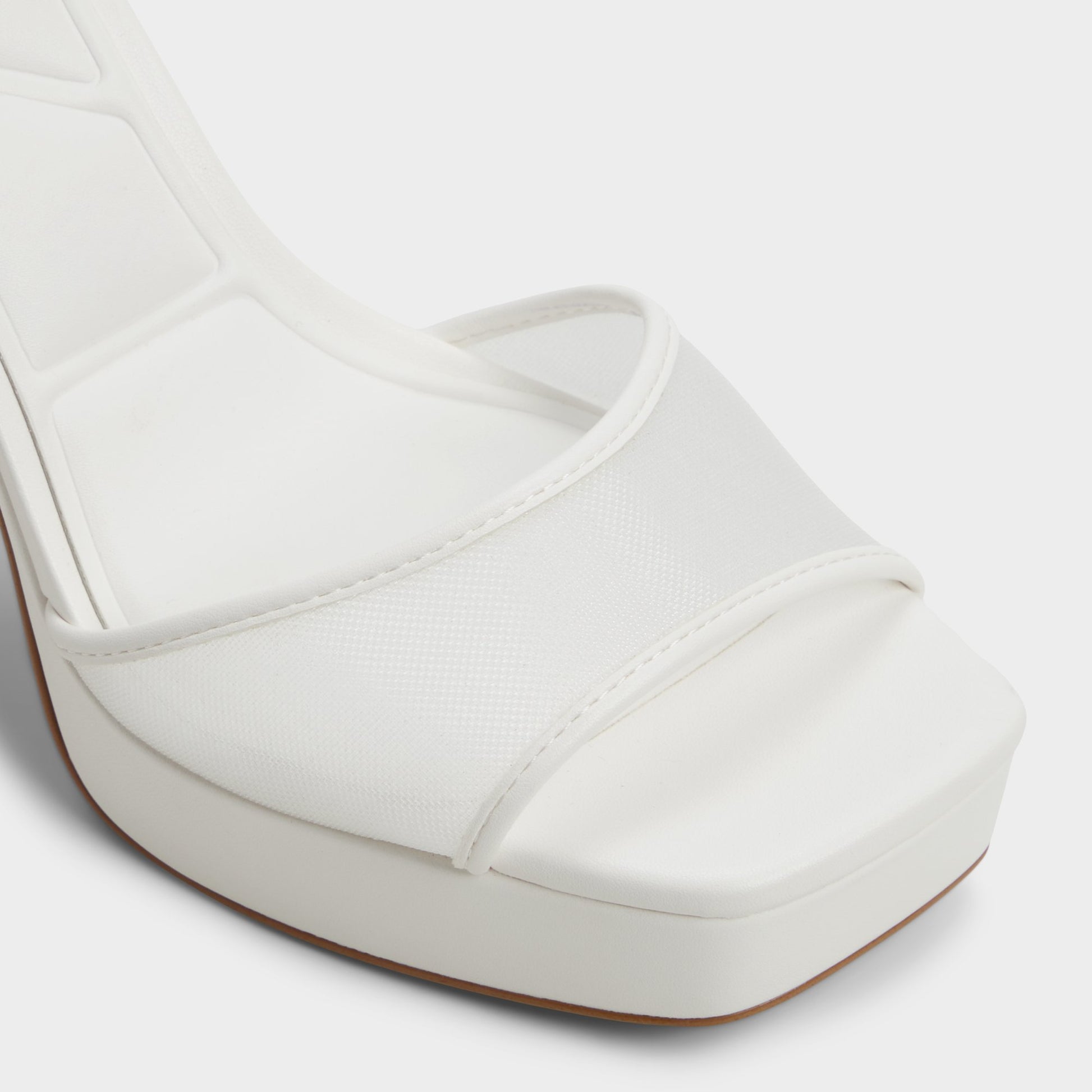Close-up of the Other White Chicglimmer Strappy heeled sandal