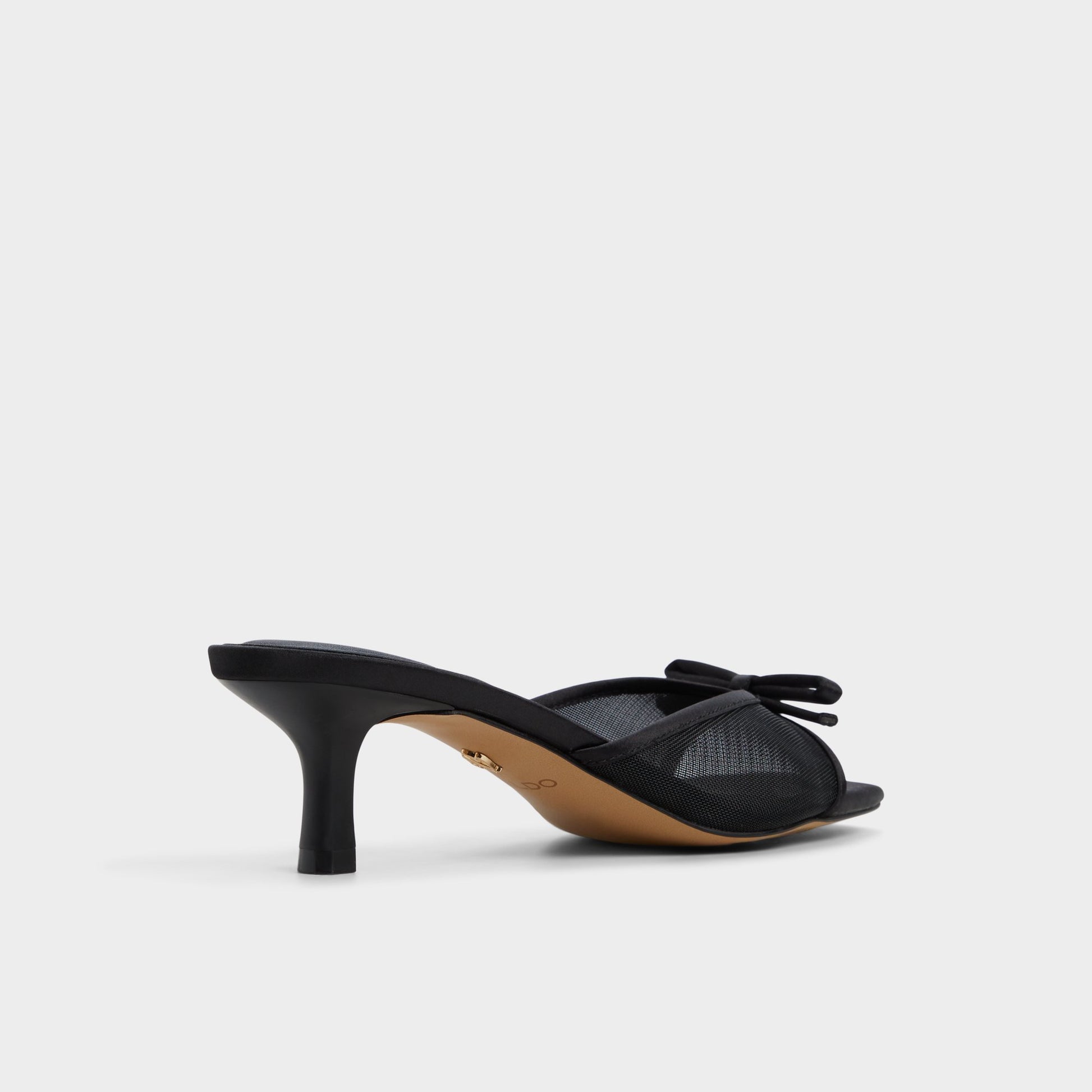 Three-quarter angle of Black Begoniaa Heeled mule's back side