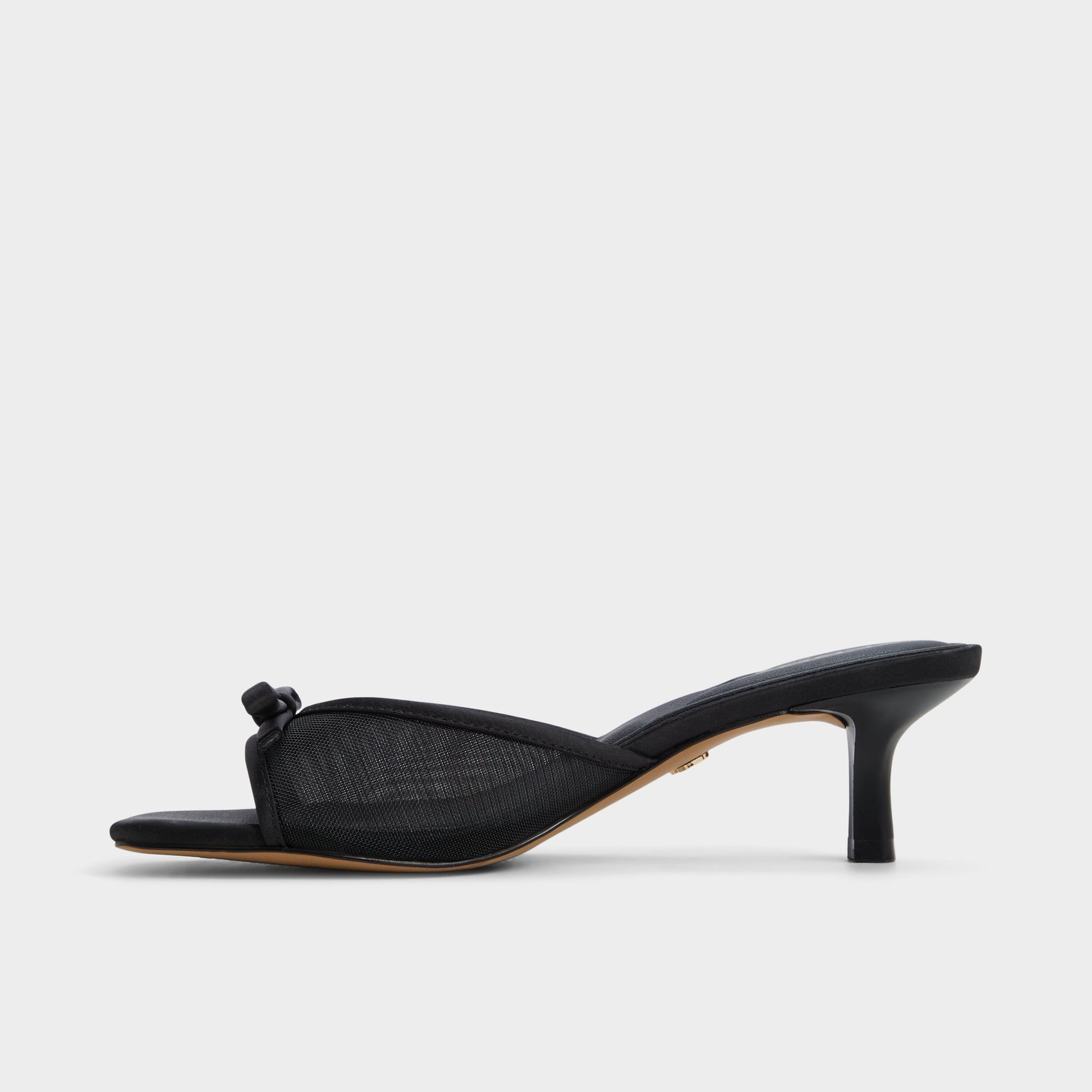 Side view of Black Begoniaa Heeled mule