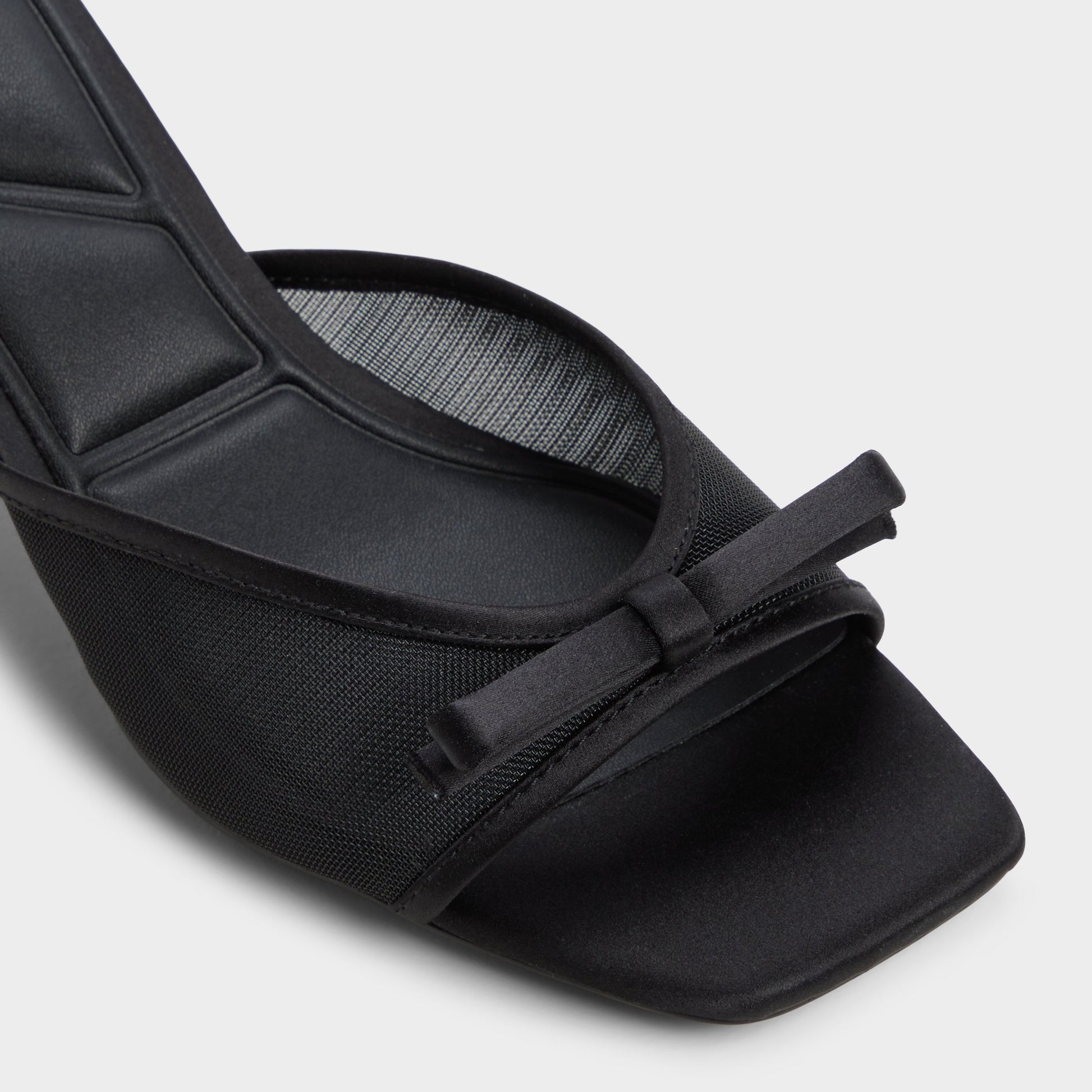 Close-up of the Black Begoniaa Heeled mule