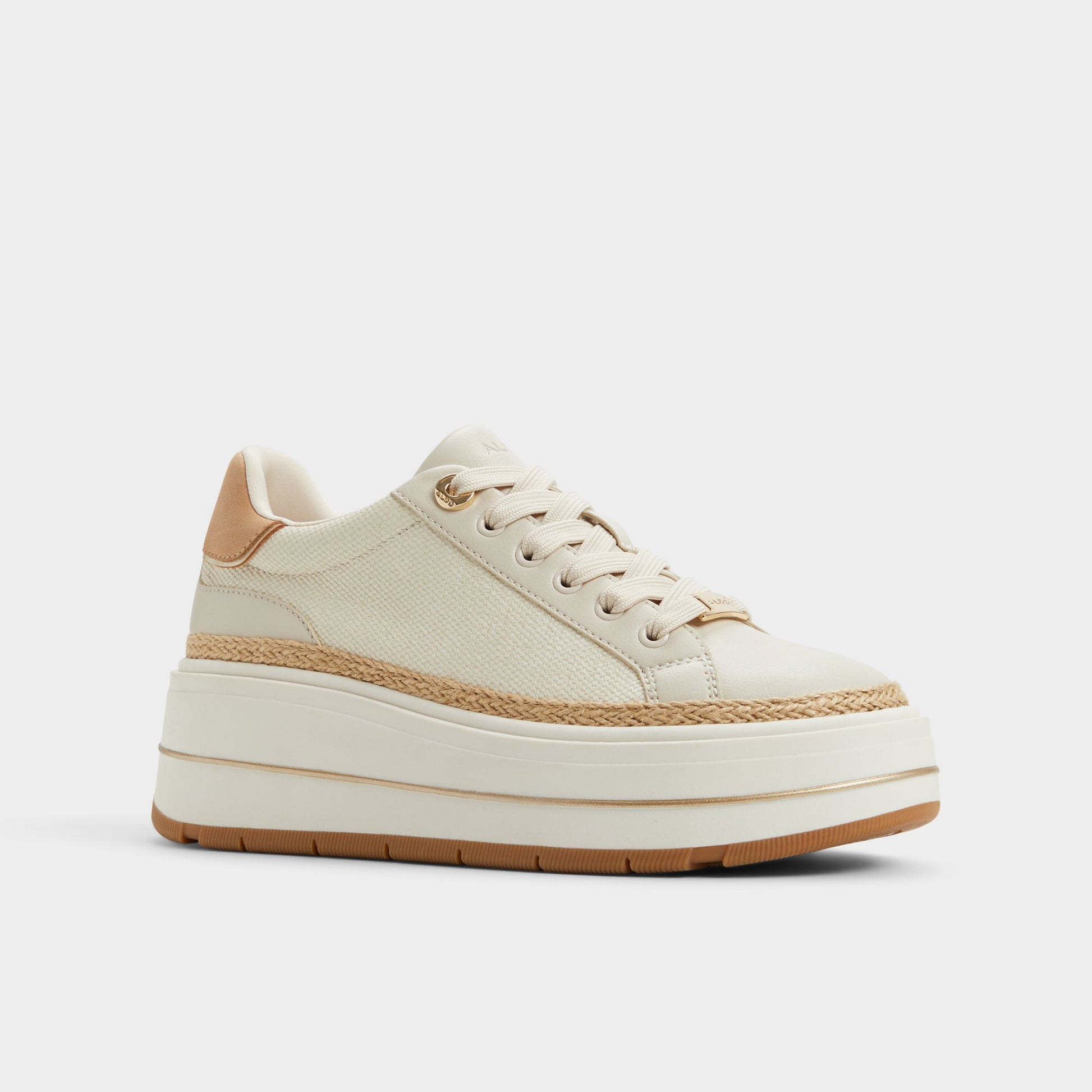 Three-quarter angle of Cream Garelia Wedge sneaker's front side