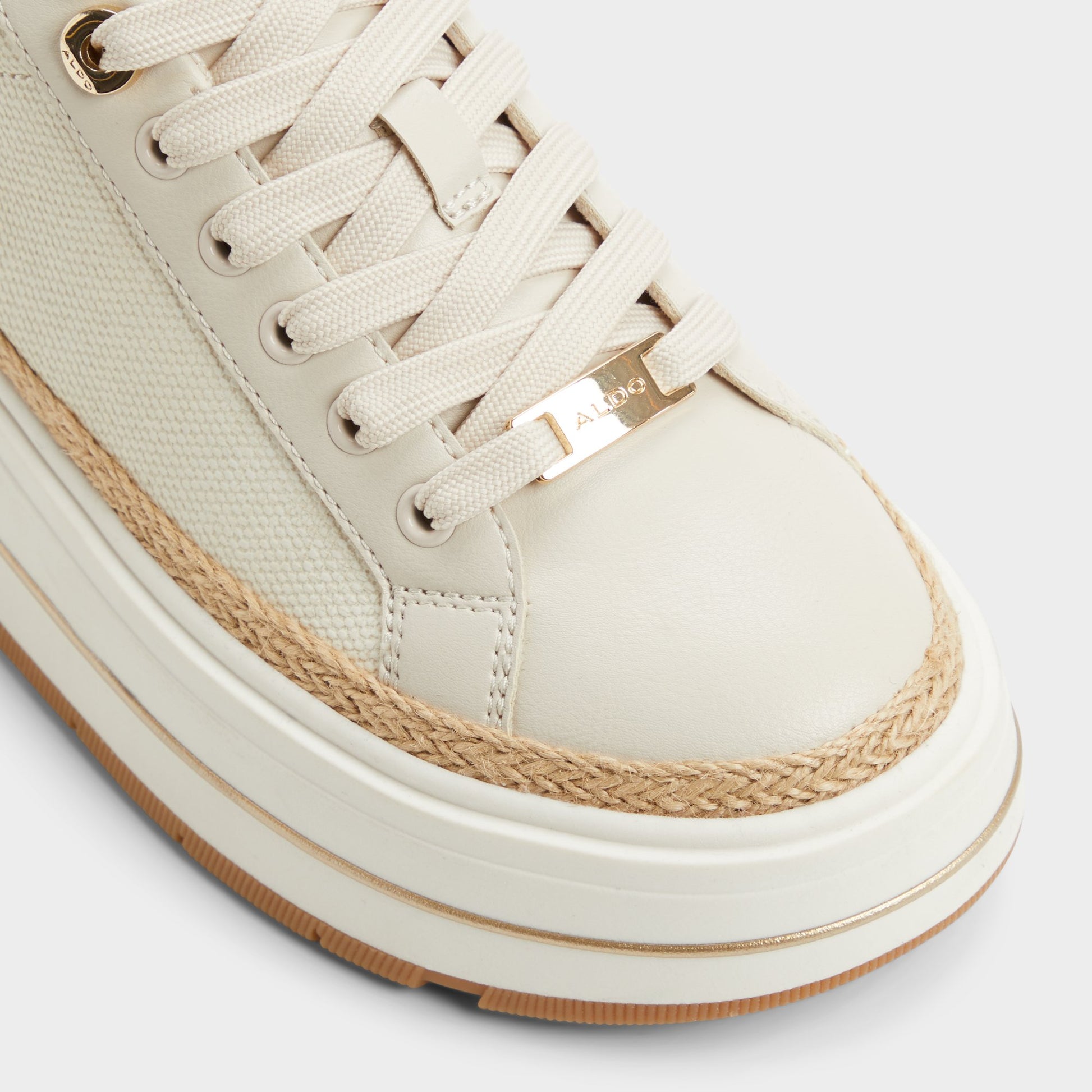 Close-up of the Cream Garelia Wedge sneaker